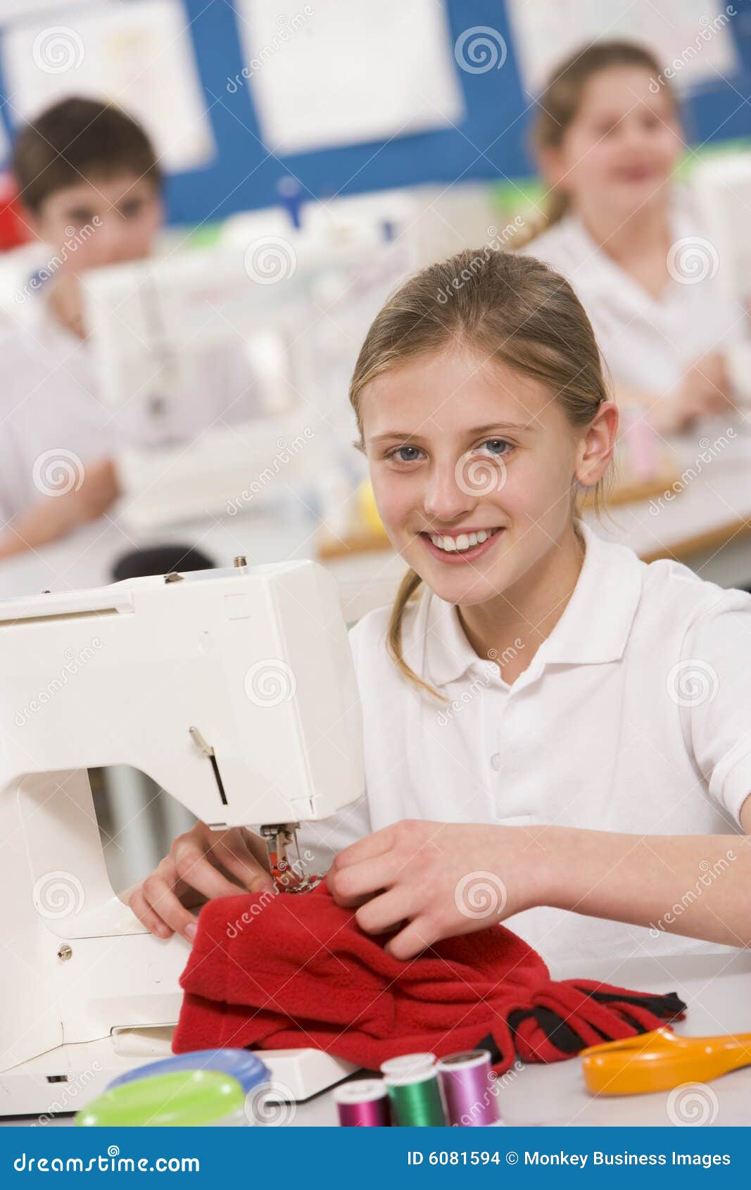 Schoolgirl Using a Sewing Machine in Sewing Class Stock Photo Image of sitting, portrait 6081594