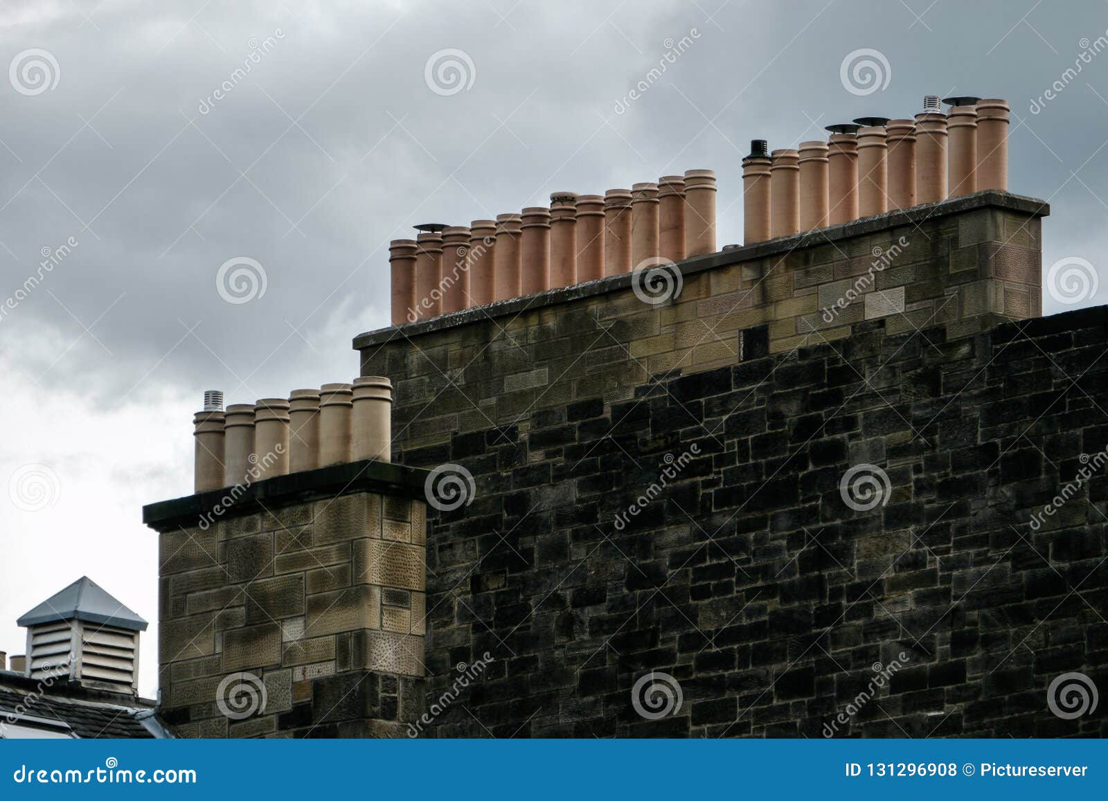 Chimneys over Edinburgh stock photo. Image of urban 131296908
