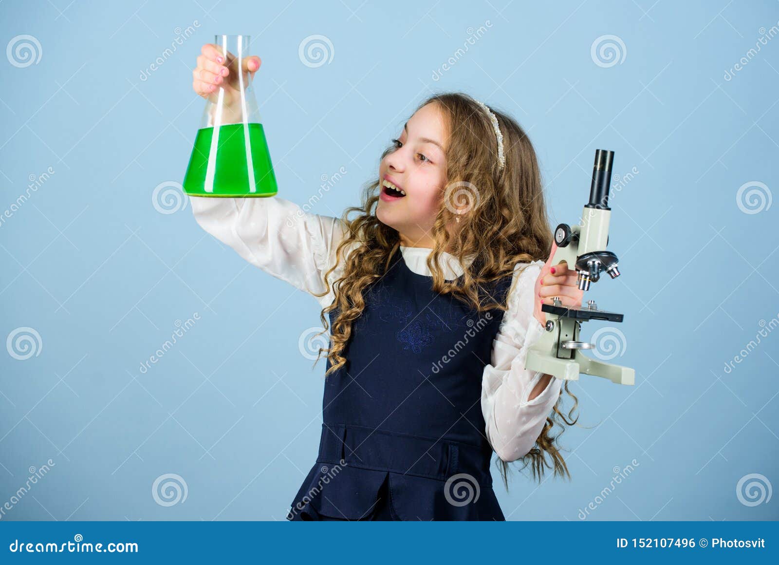 science research in lab. small girl with microscope. child study bilogy lesson. discover future. back to school