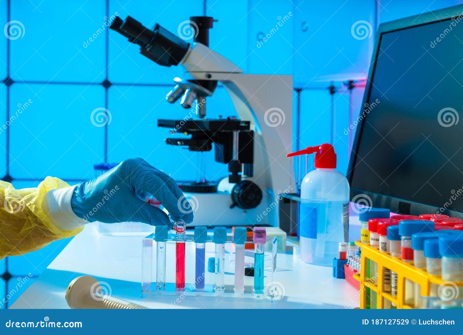 Scientific Experiment in Microbiological Lab. Microscope and Test Tube