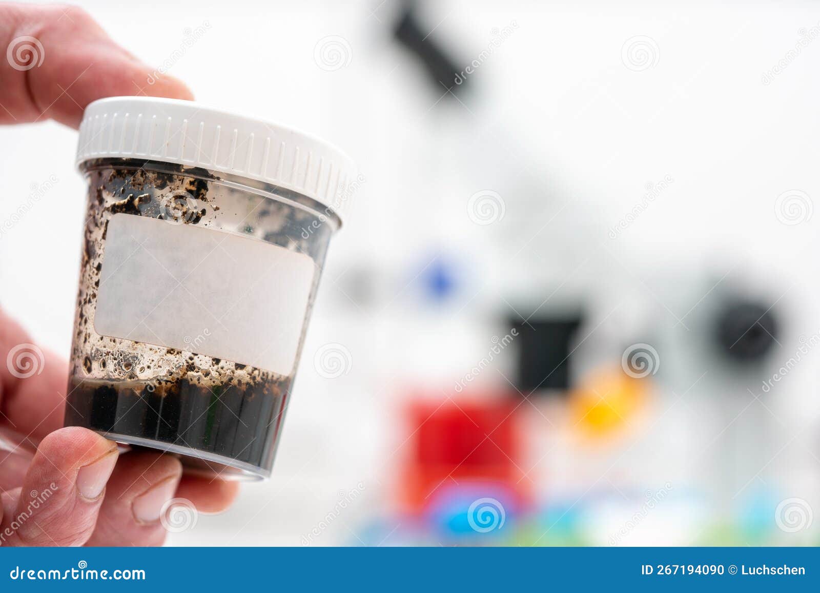 Scientist Ecologist Holds a Container with a Soil Sample for Chemical