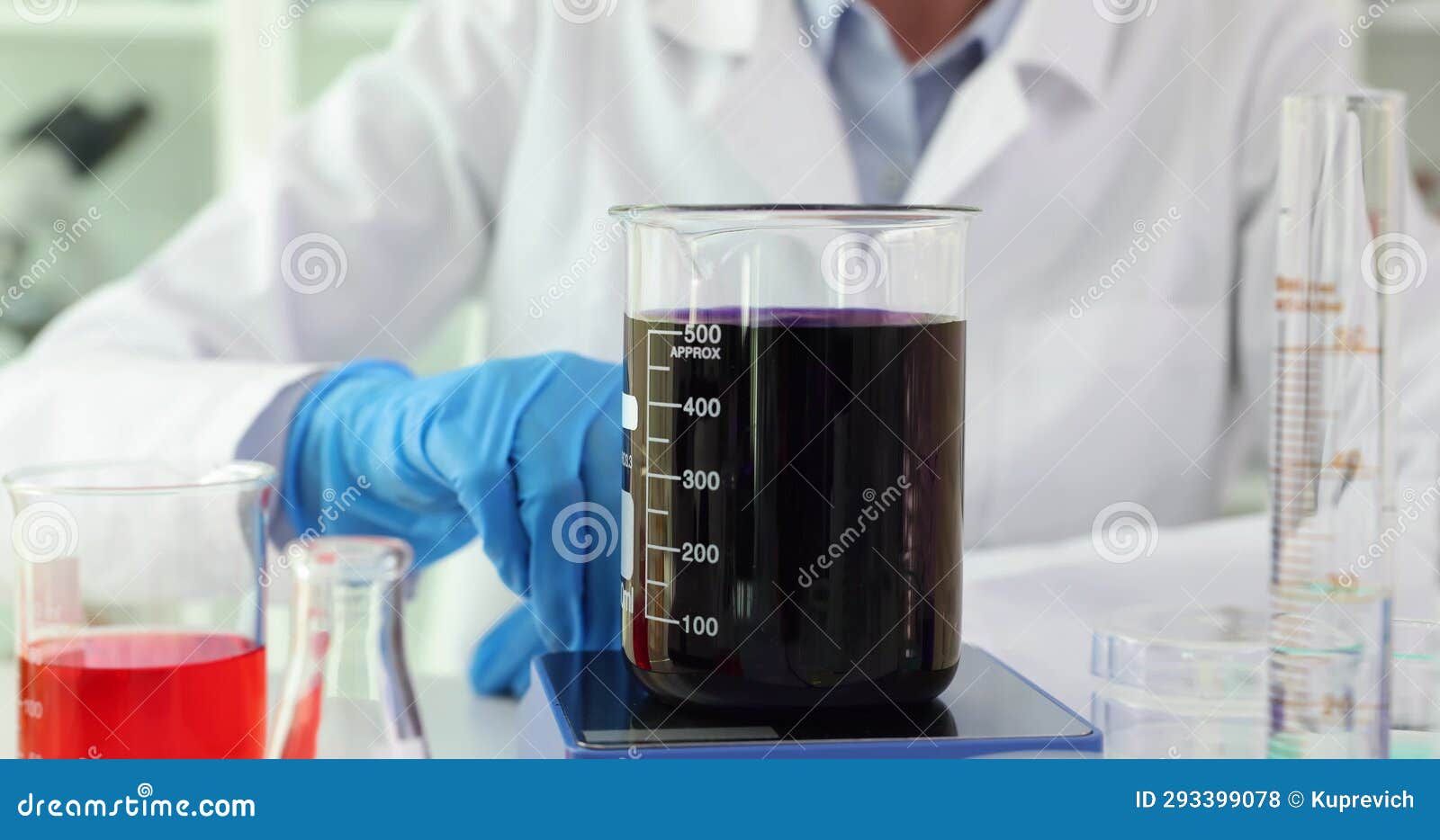 Scientist Flask with Boiling Black Solution in Lab Stock Footage
