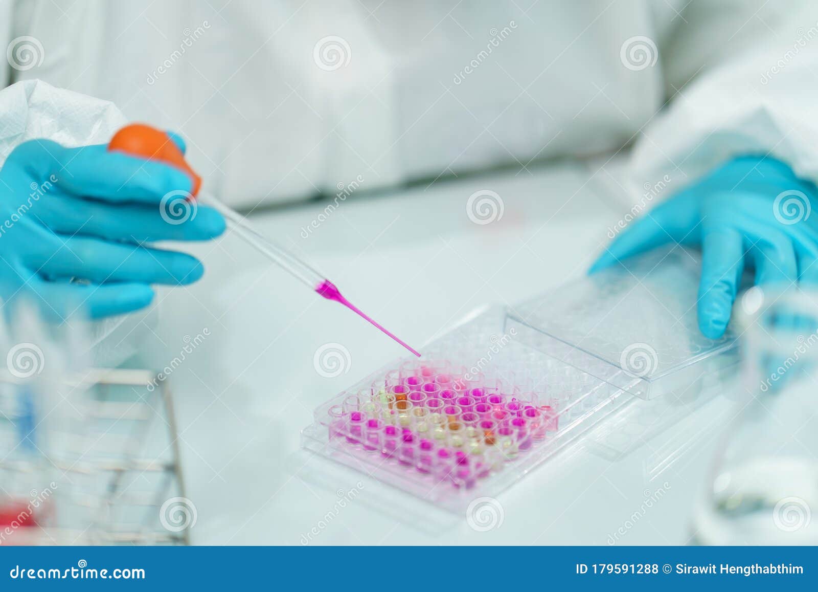 Scientist in Laboratory with Biological Tube for Analysis and Sampling
