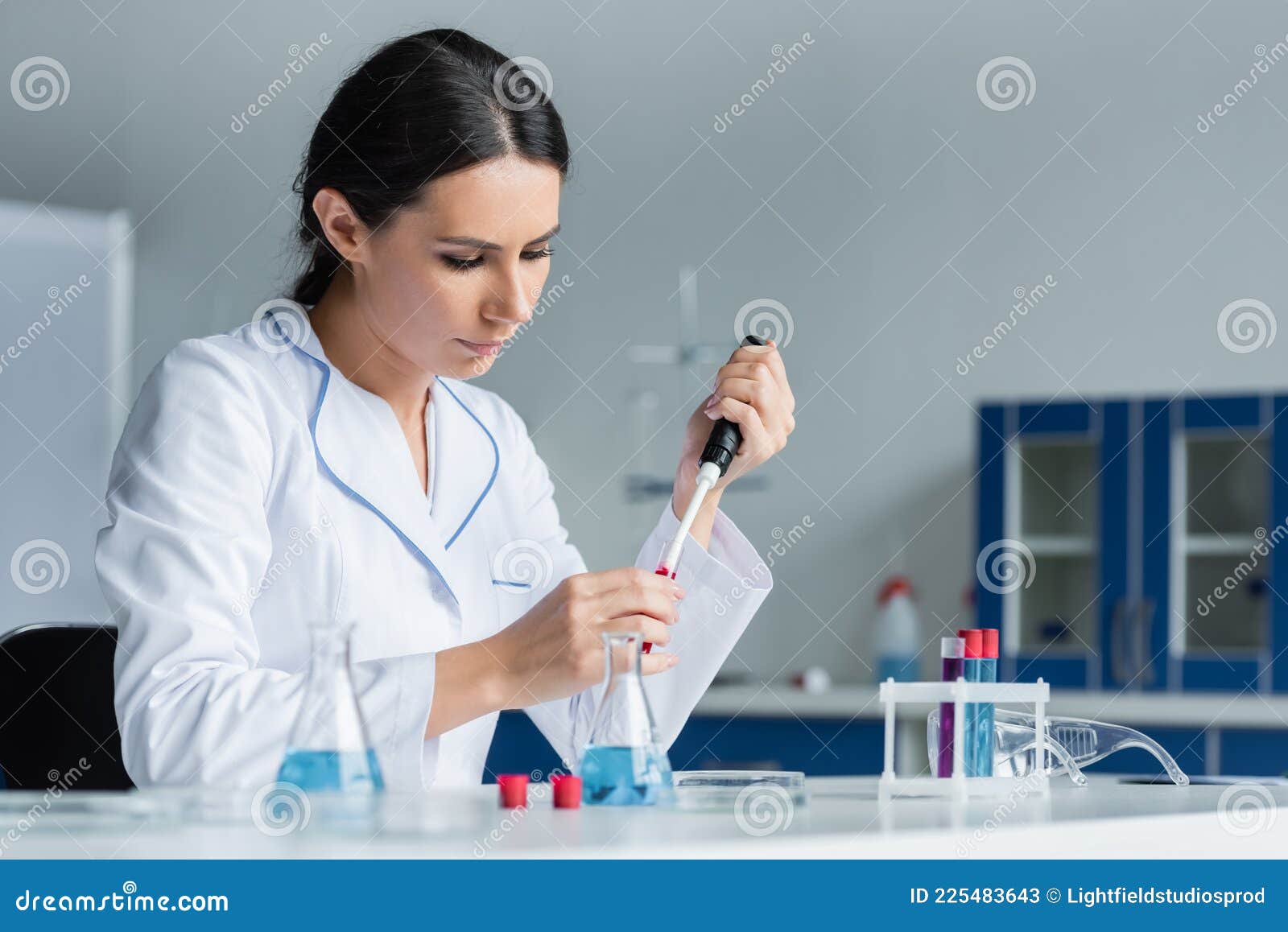 Scientist Picking Up Blood Sample in Stock Image Image of blur