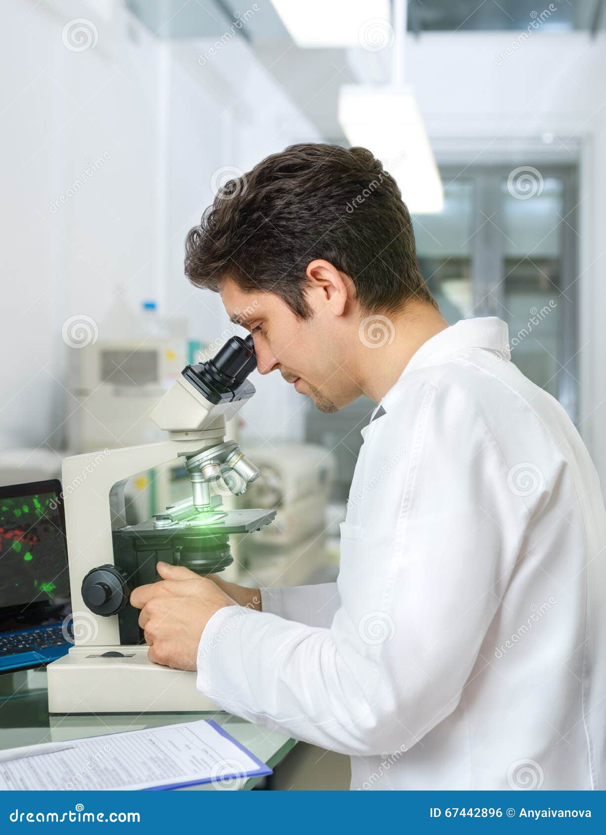 Scientist or Tech with Dark Hair and Brown Eyes Works with Micro Stock