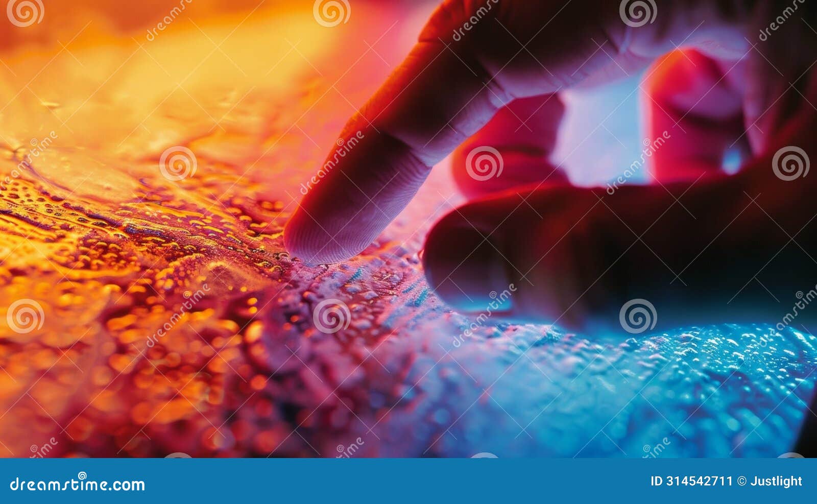 a scientists finger touching a section of a heatsensitive material causing a vivid color change to occur within seconds