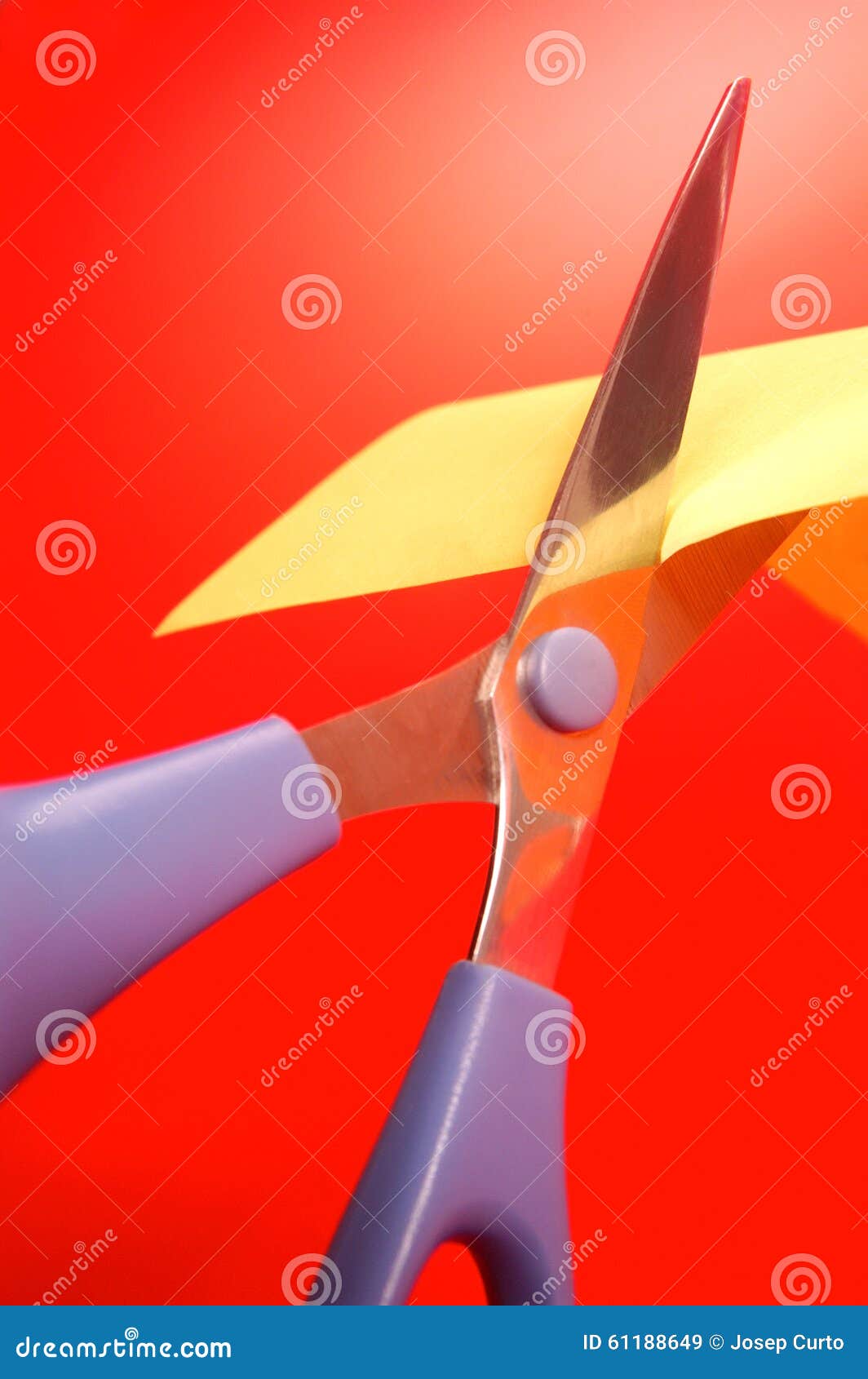 Scissors Cutting a Yellow Paper Stock Image Image of yellow, slanted