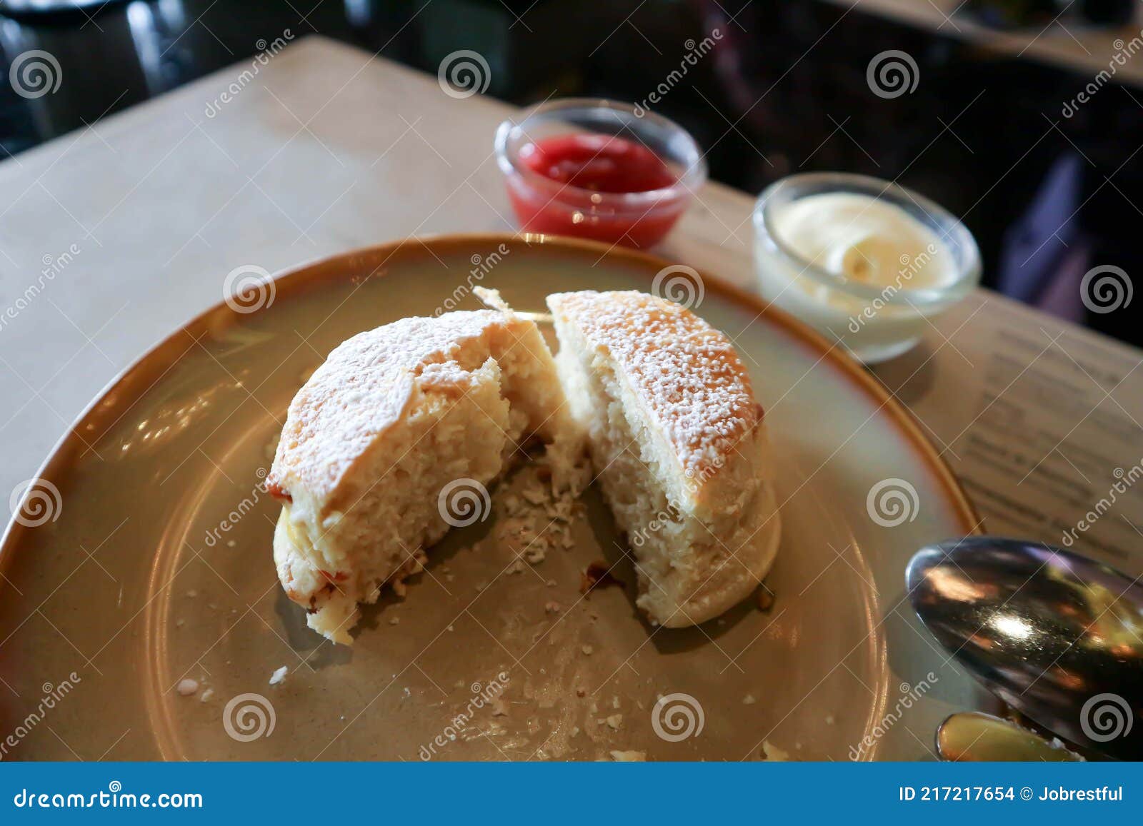 Scone , Scone with Strawberry Sauce and Whipping Cream Stock Photo