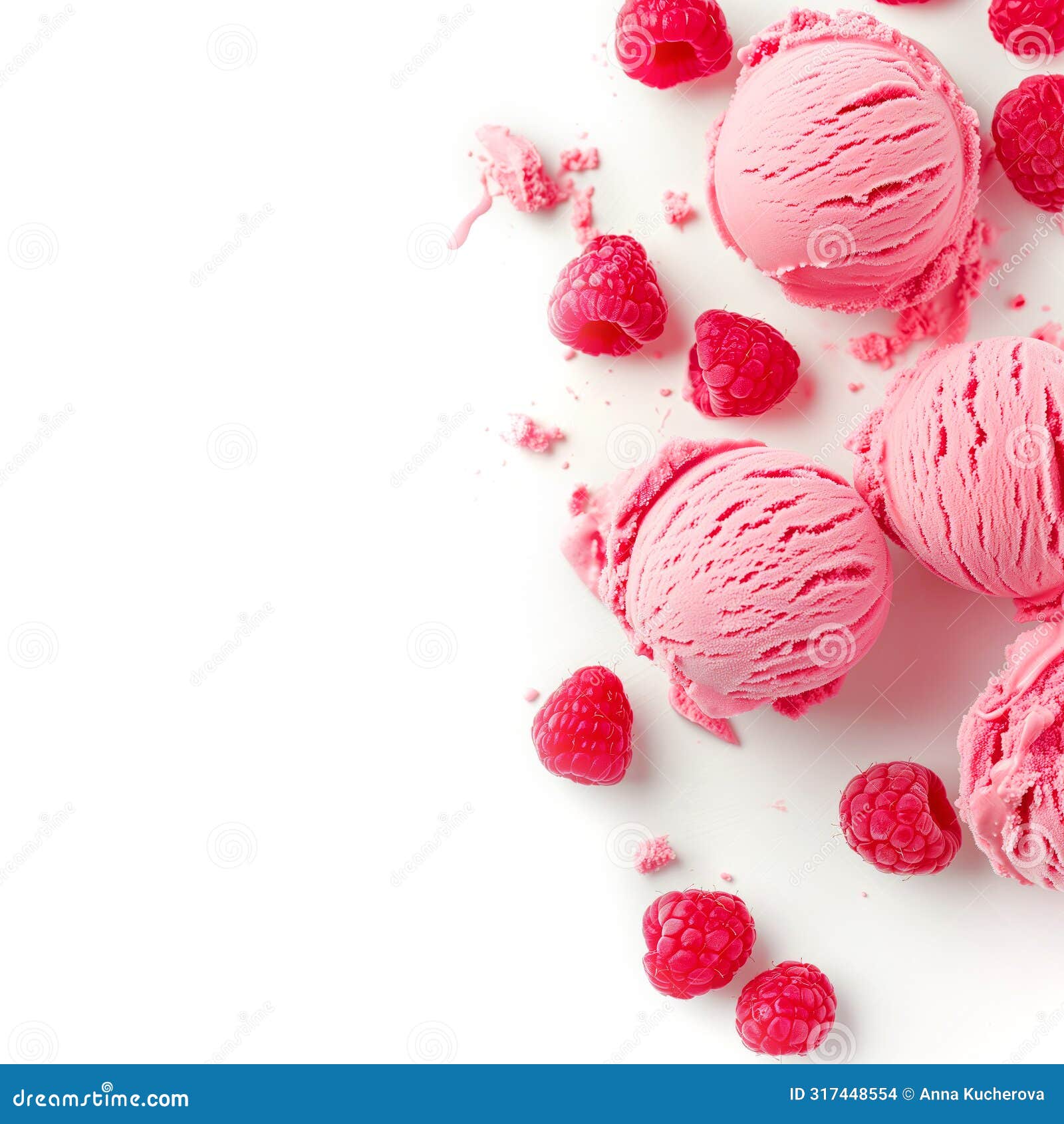 scoops of raspberry ice cream scattered with whole raspberries