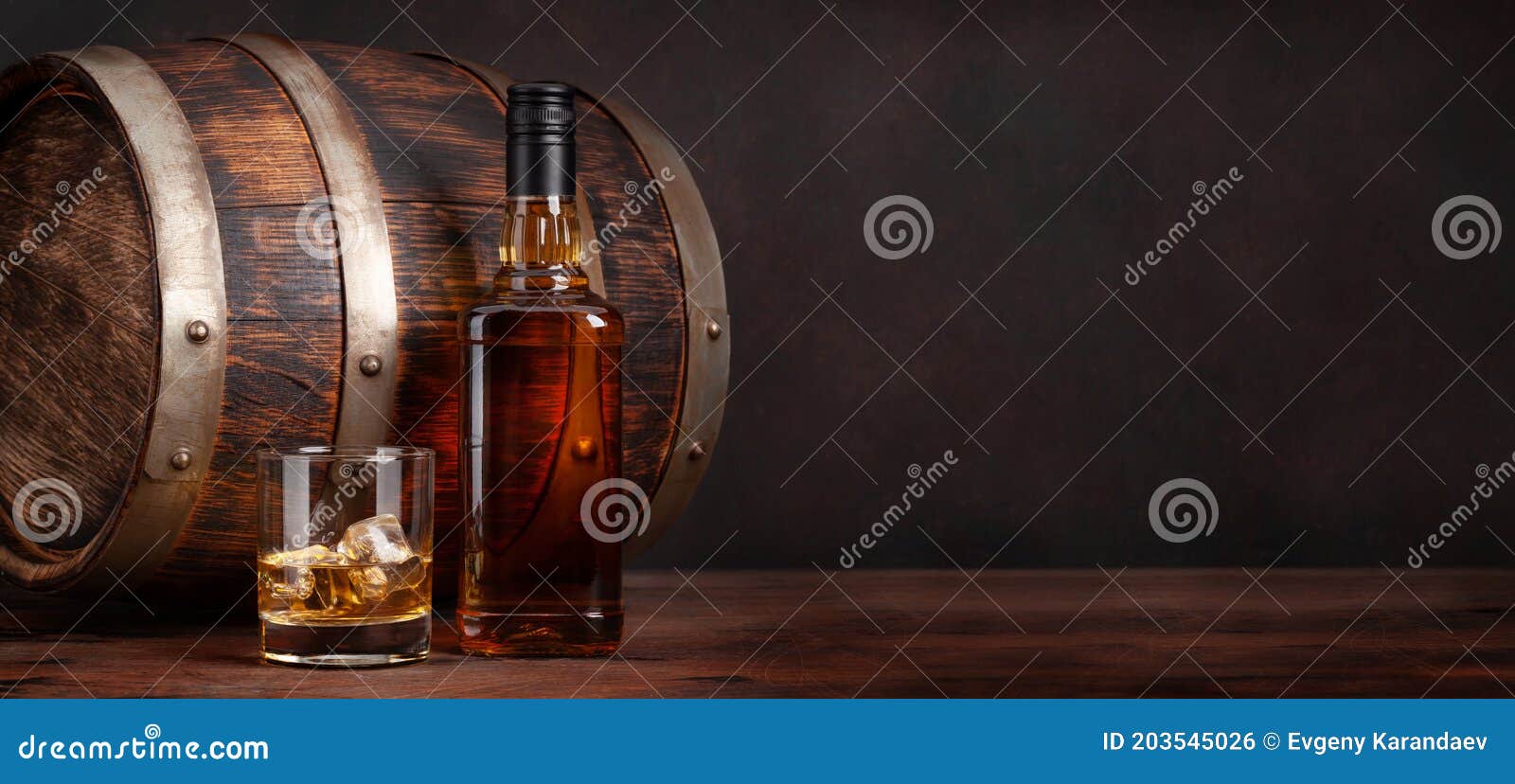https://thumbs.dreamstime.com/z/scotch-whiskey-bottle-glass-old-barrel-wooden-copy-space-203545026.jpg