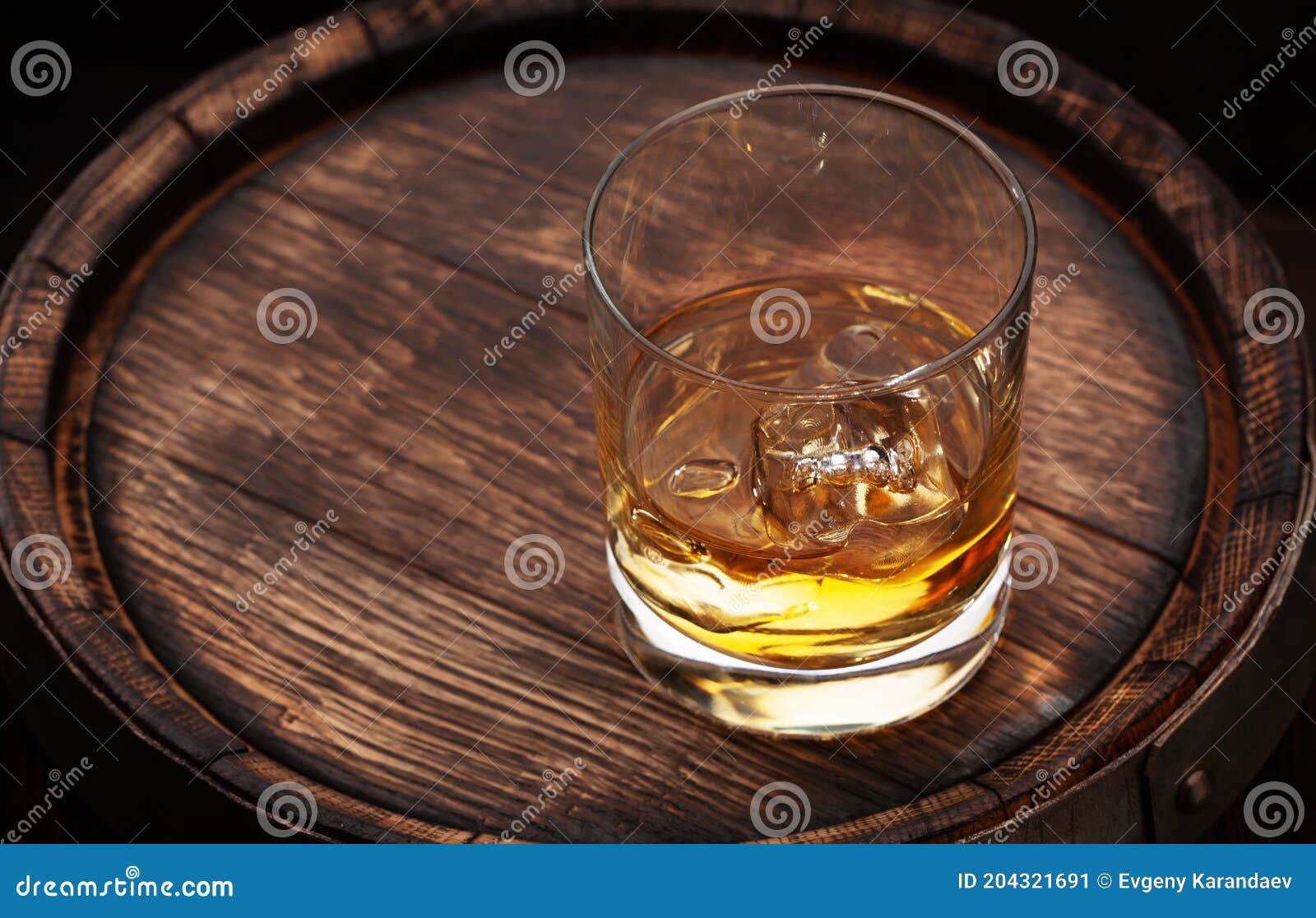 Whiskey glass and old wooden barrel Stock Photo by ©Shaiith79 65126419