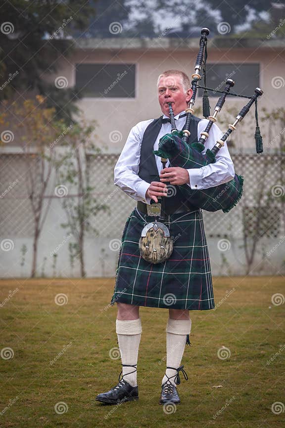 Scottish Piper from Scotland in Traditional Outfit with Tartan Kilt ...