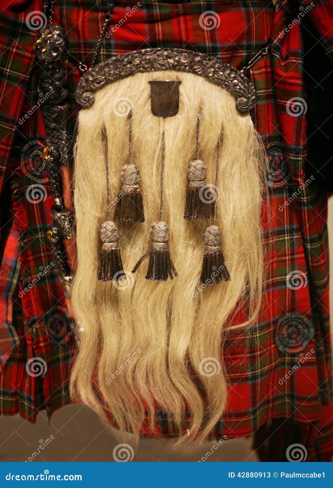 Color detail of a traditional Scottish kilt, with a bag Stock Photo - Alamy