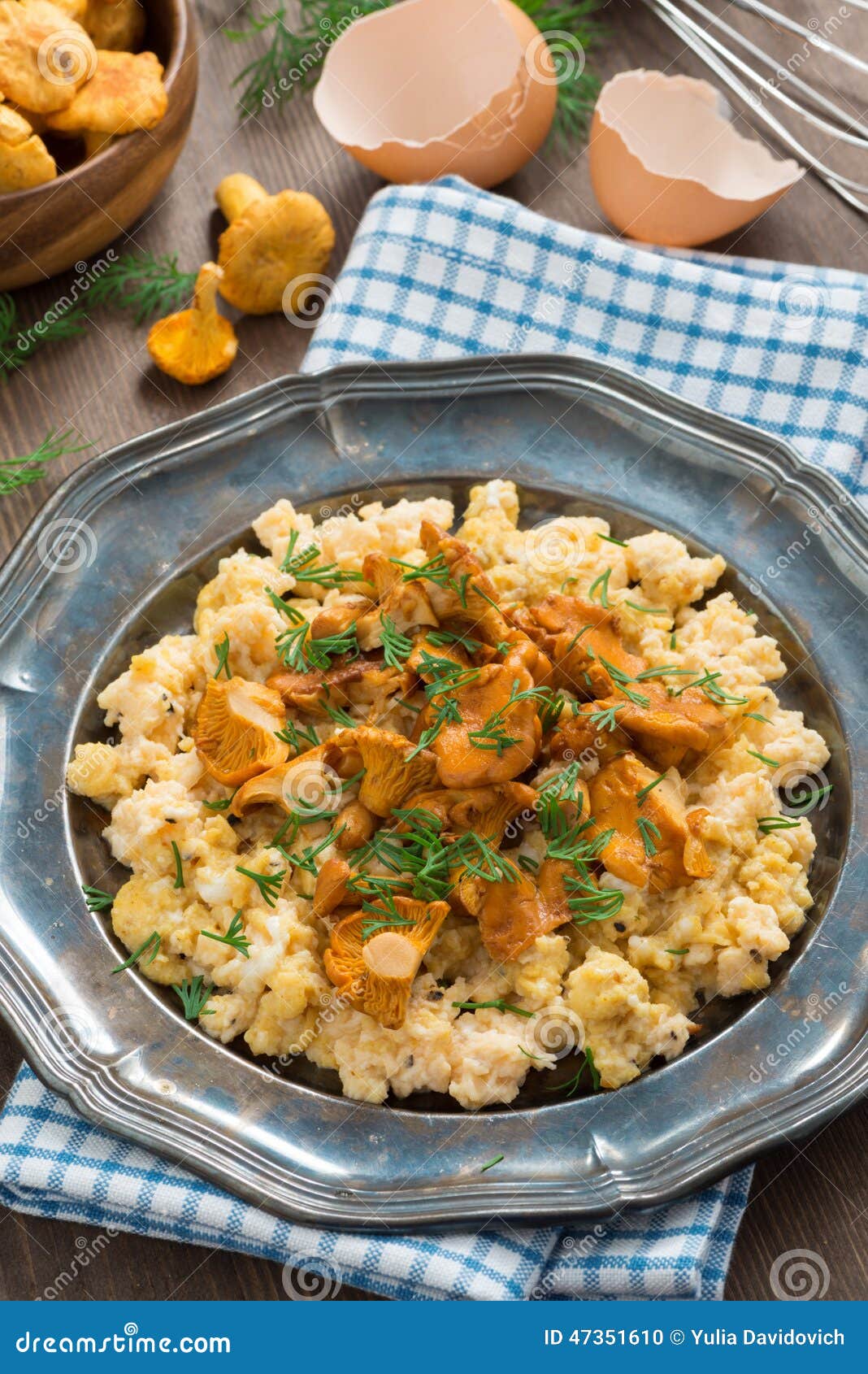 Scrambled Eggs with Chanterelles and Fresh Dill, Top View Stock Photo