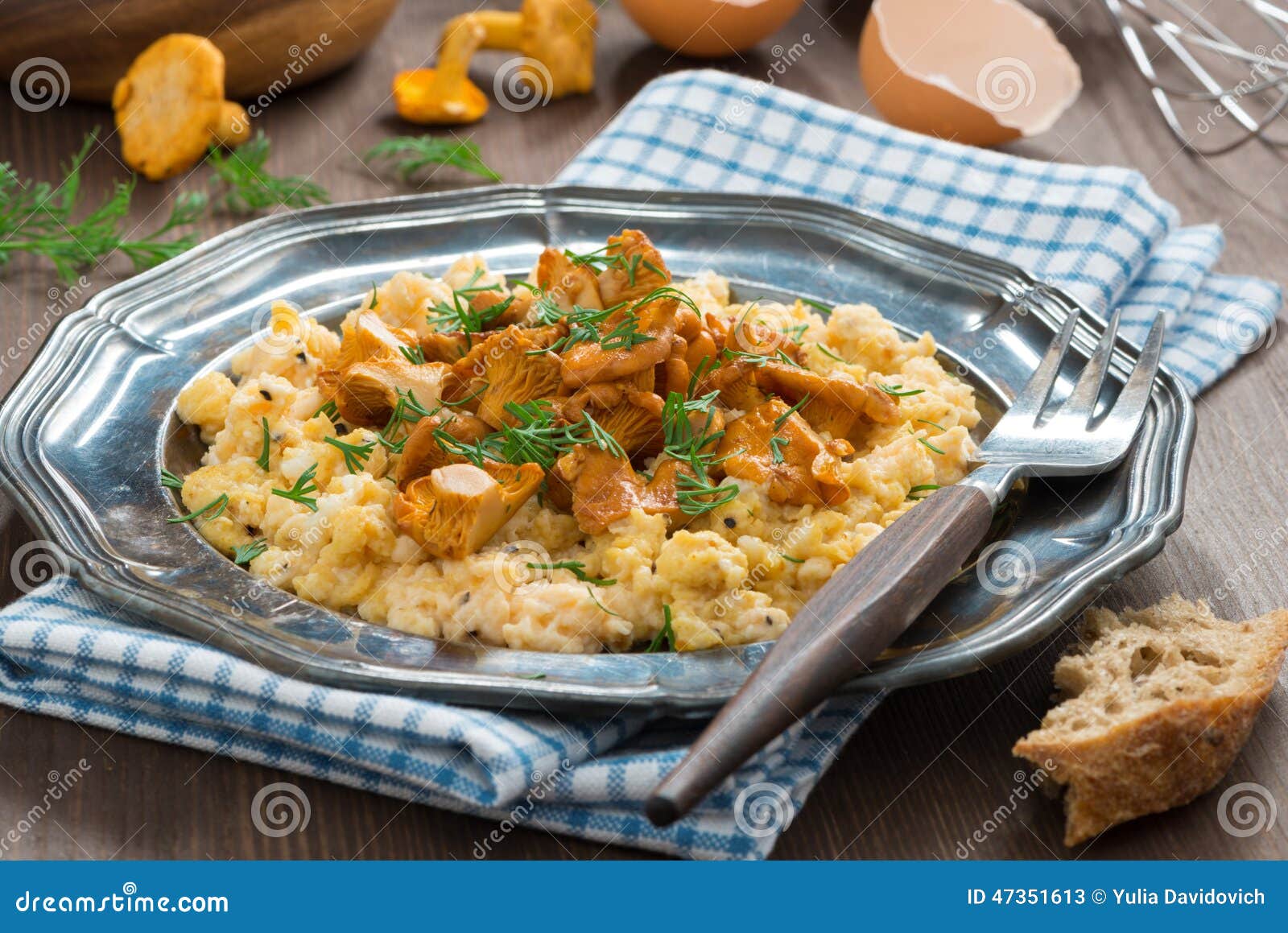 Scrambled Eggs with Chanterelles and Herbs on Plate, Horizontal Stock