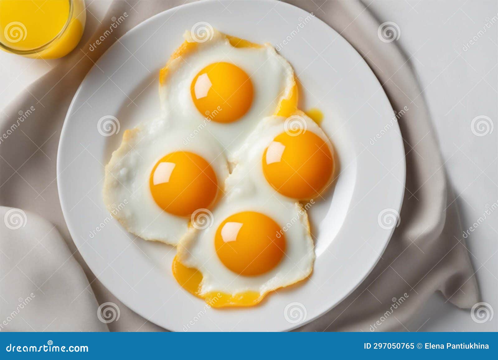 Fried Eggs on a White Plate. Scrambled Eggs with Whole Yolks. Serving