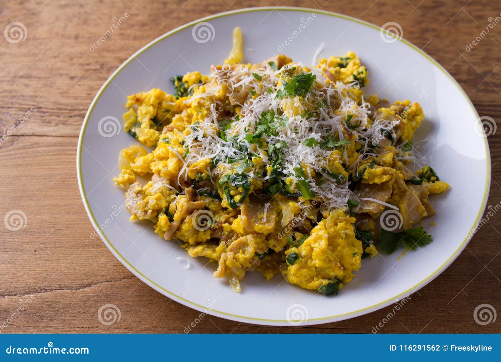 Scrambled Eggs with Pancetta, Spinach, Onion and Parmesan. Omelette