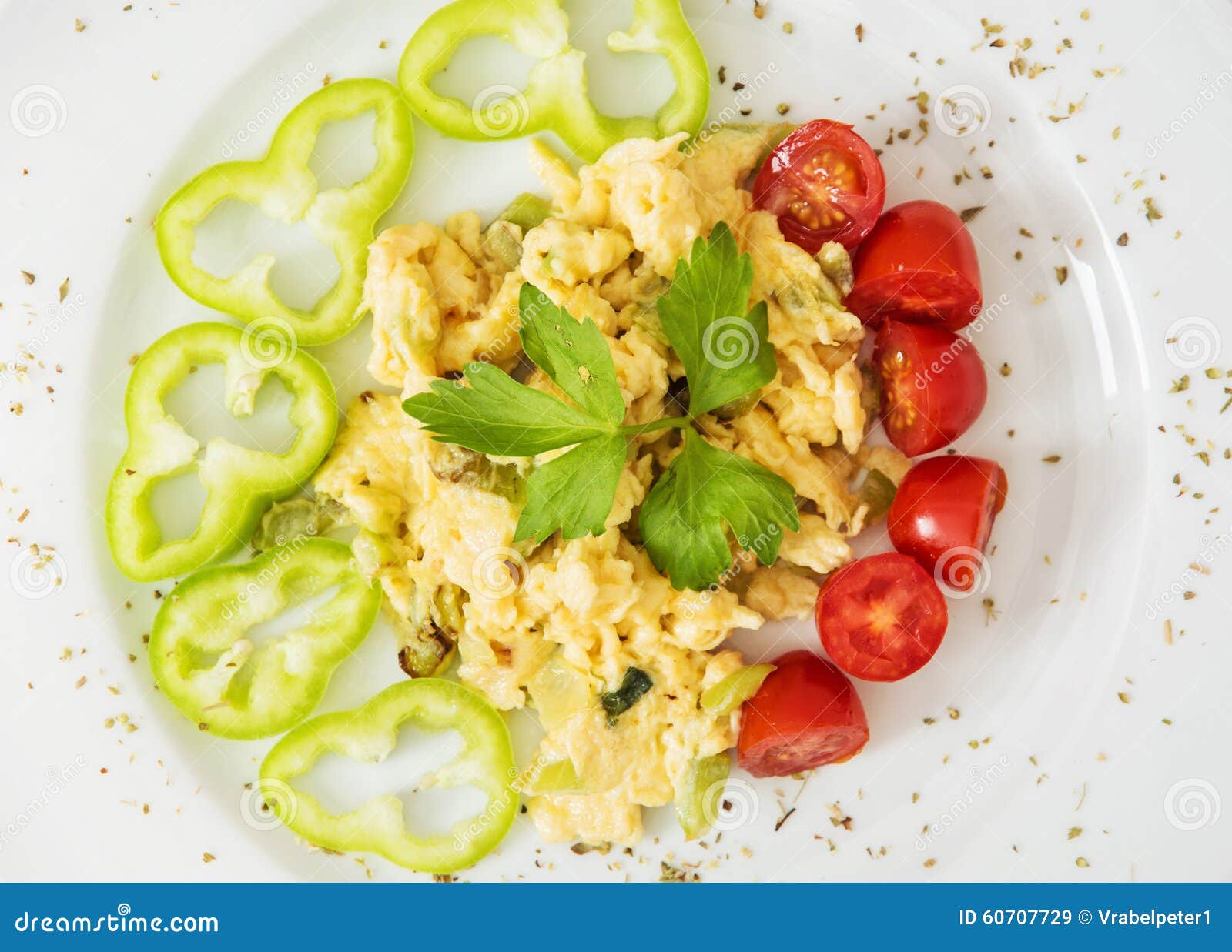 Scrambled Eggs with Paprika, Cherry Tomatoes and Celery Leaves Stock