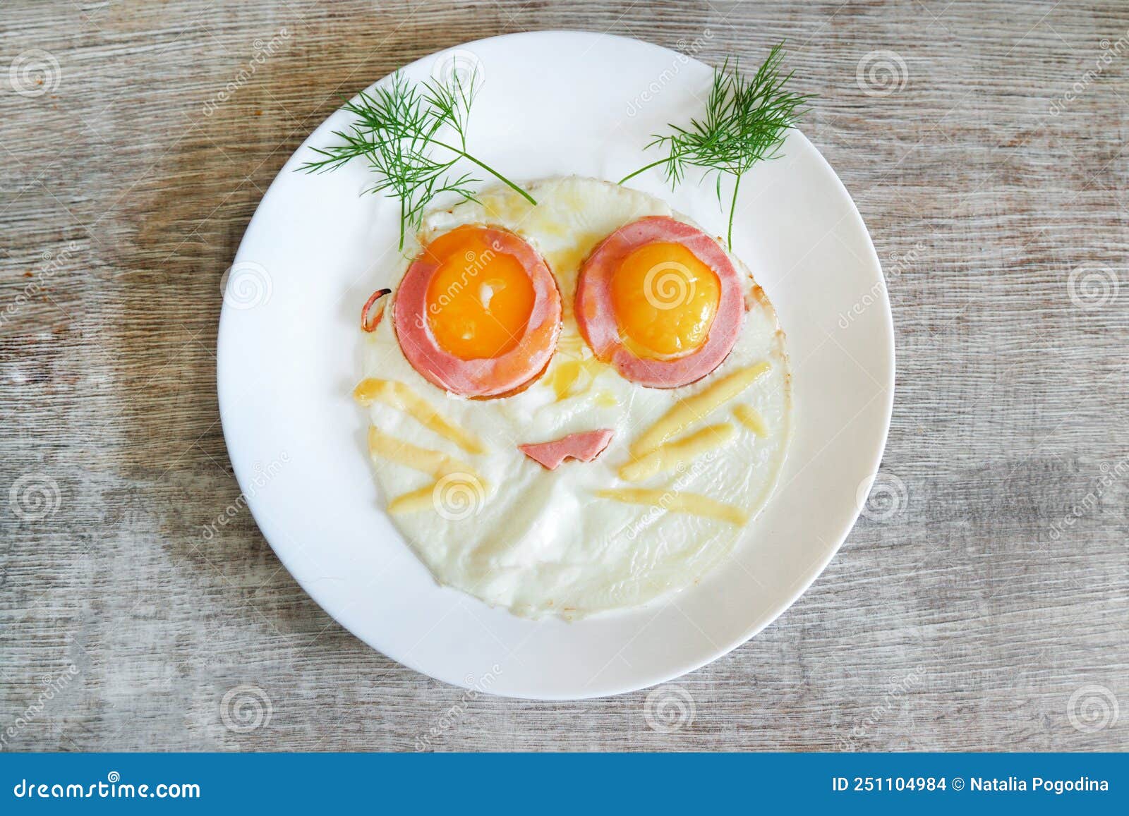 Scrambled Eggs on a Plate As Cat. Stock Photo Image of round, delicious 251104984
