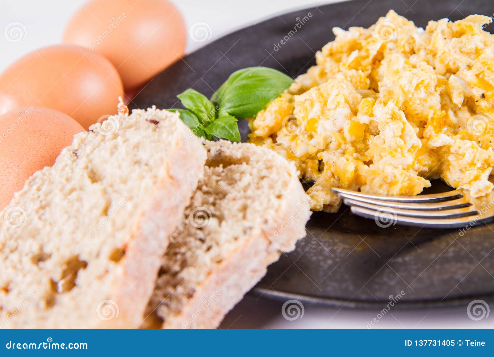 Scrambled Eggs with Some Bread Stock Image - Image of continental