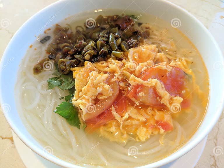 Scrambled Eggs and Sour Peas on Chinese Traditional Rice Noodles Stock