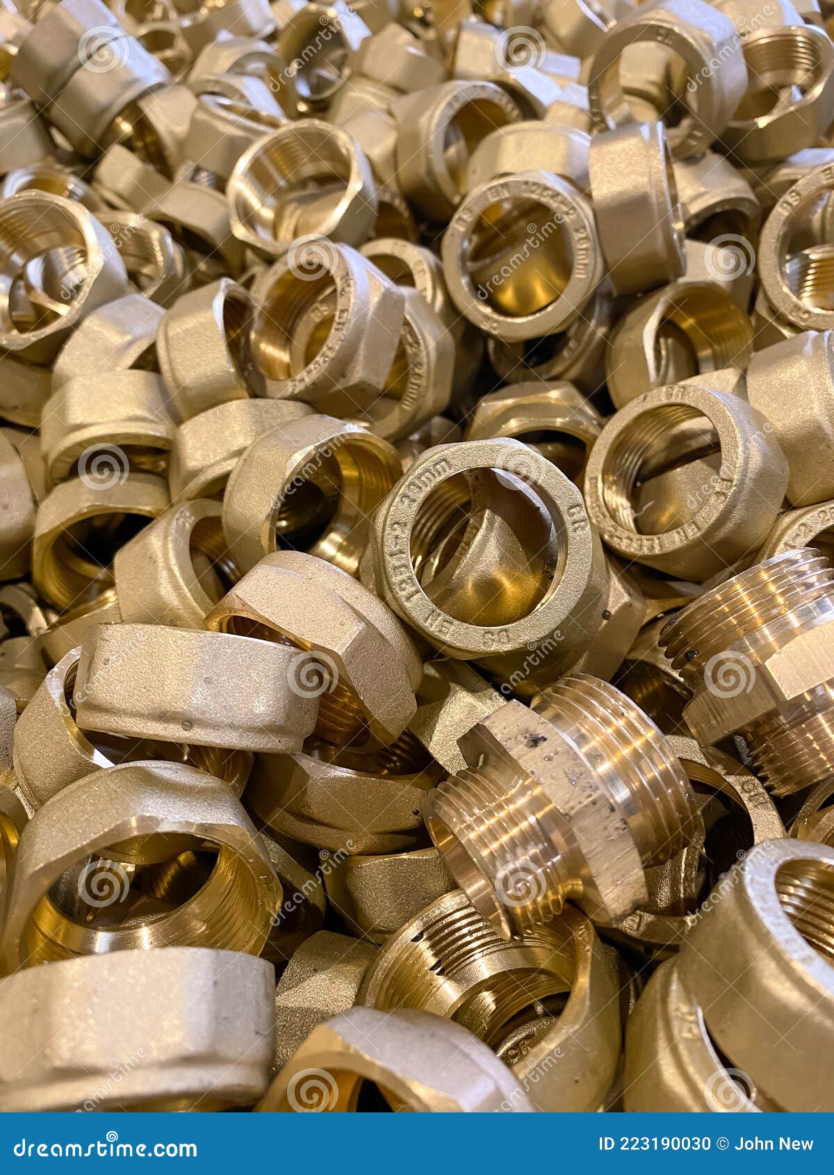 Scrap Brass Nuts and Fittings Ready To Be Recycled Stock Photo