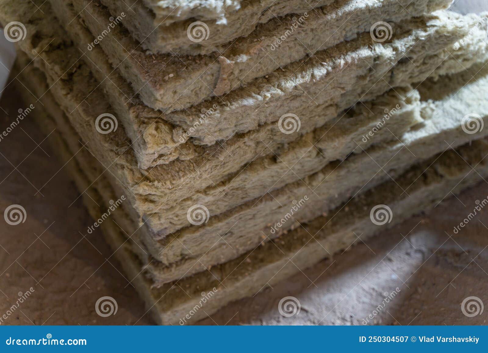 Scraps of Green Mineral Wool Piled Up. Safe Insulation Material for the