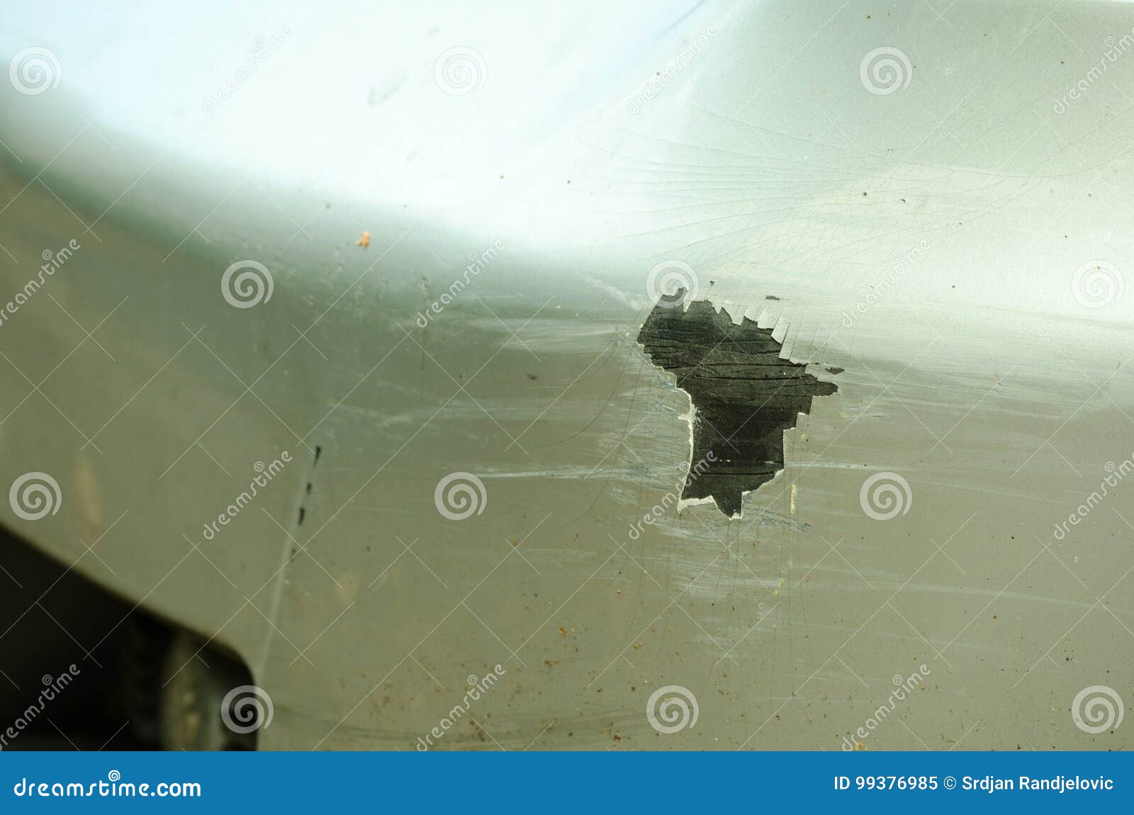 Scratched Silver Car Bumper on the Parking Lot. Stock Image Image of