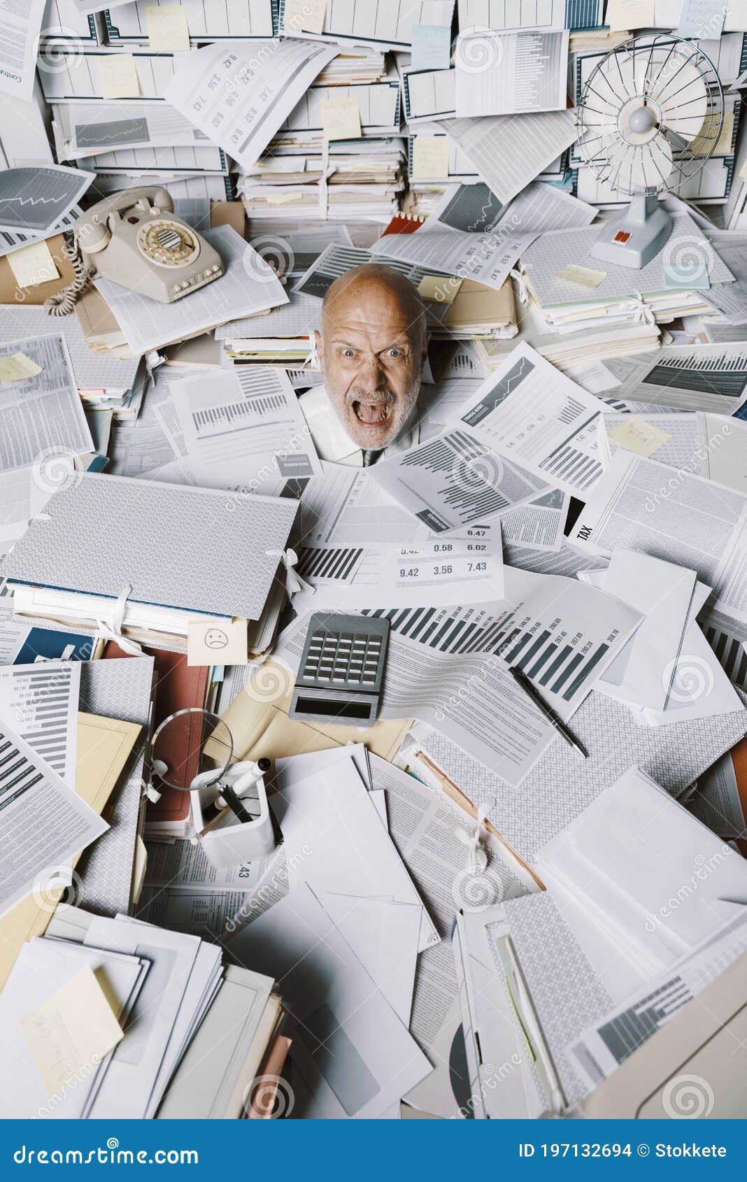 screaming businessman drowning under a lot of paperwork