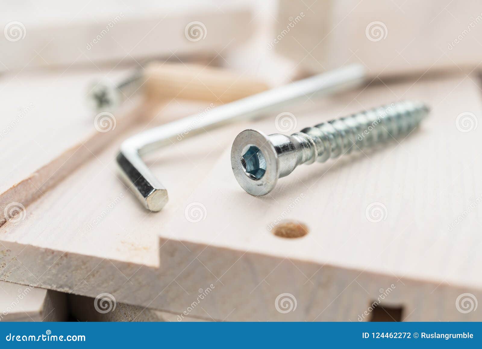 close-up photo of for furniture assembly on the wooden table