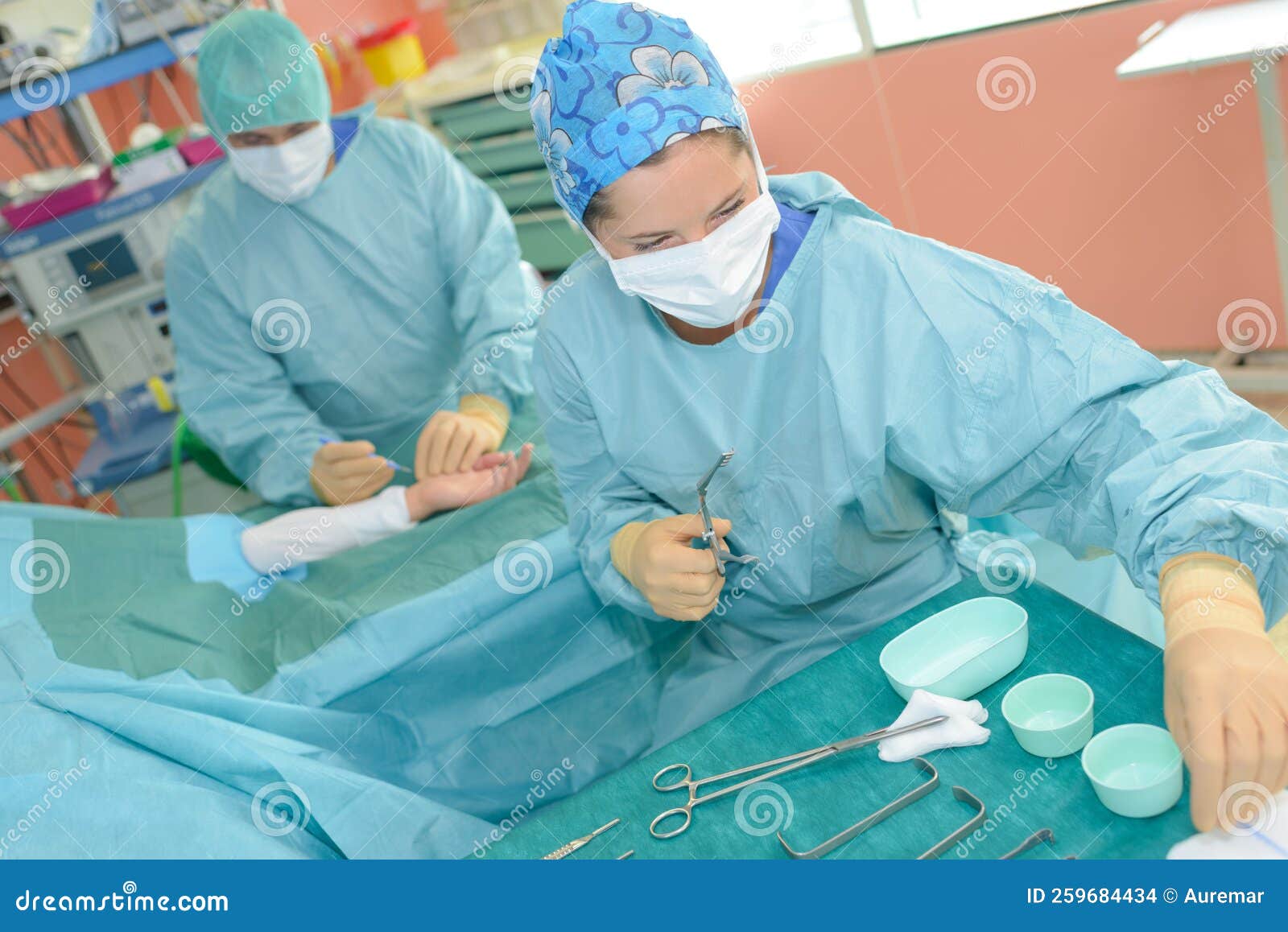 Scrub Nurse Preparing Tools for Operation Stock Photo Image of people