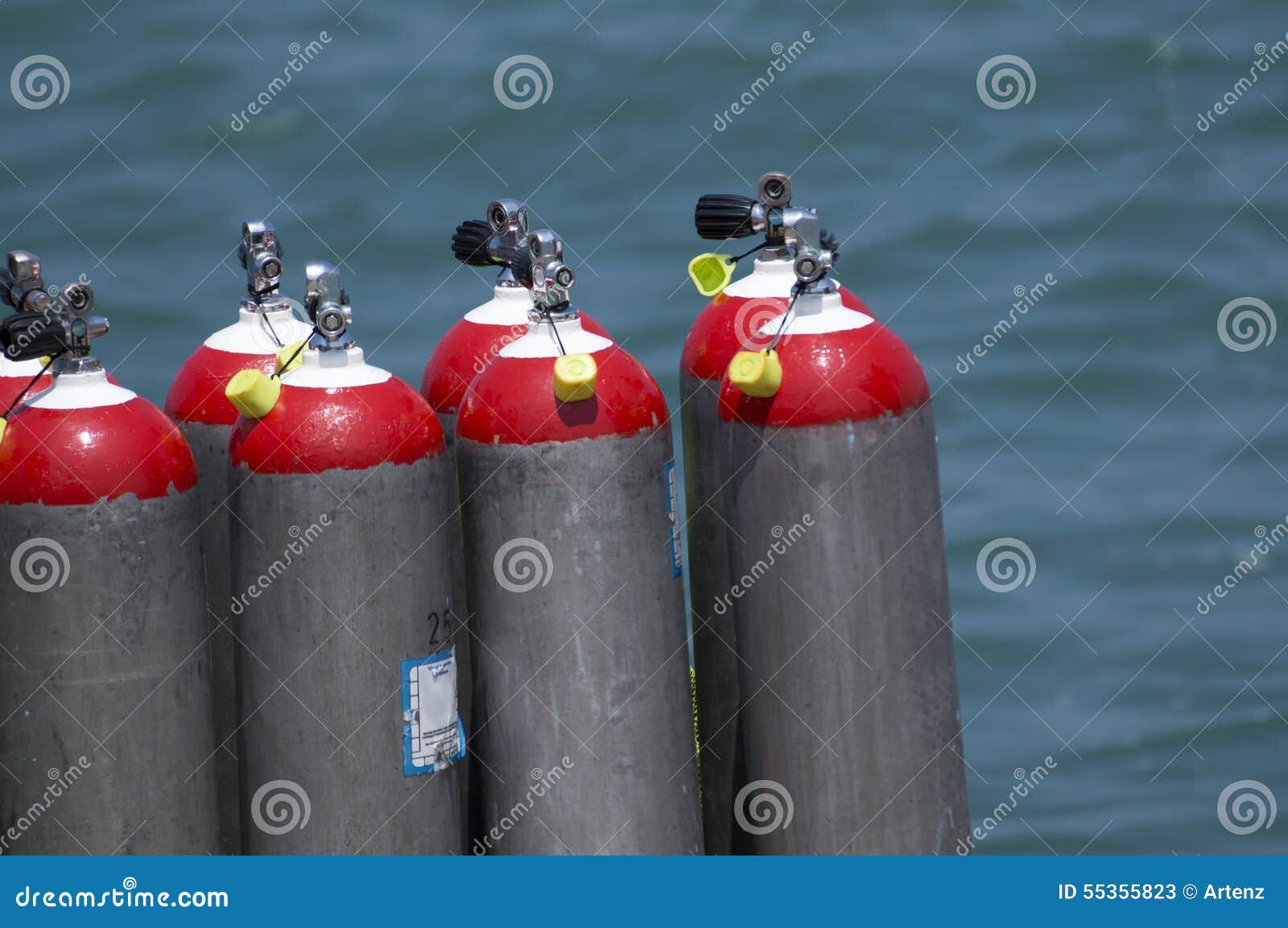 Air Cylinders For Scuba Diving On The Pier. Full Oxygen Tanks And