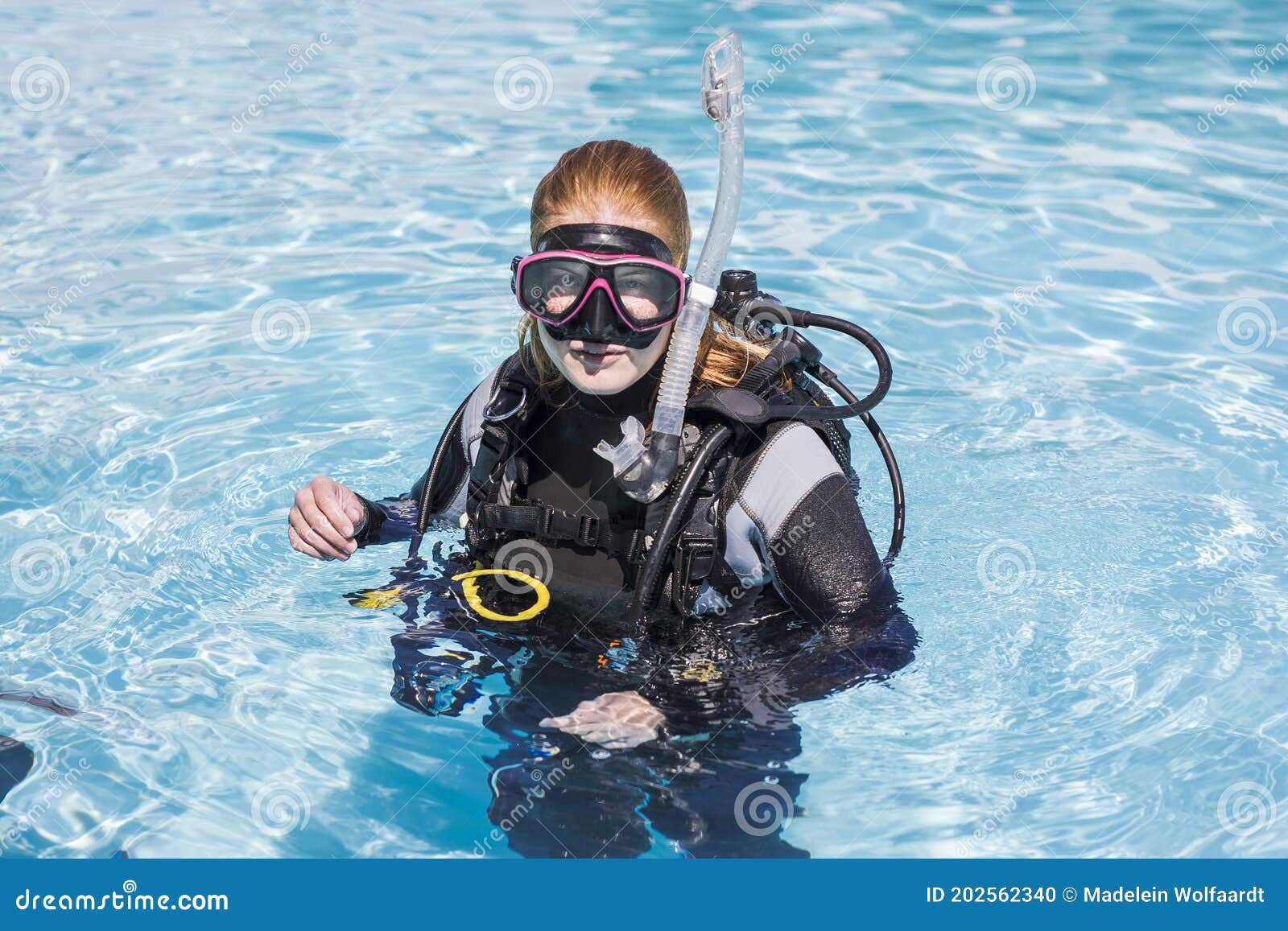 Scuba Dive Training in a Pool with Diver Looking at the Camera Stock
