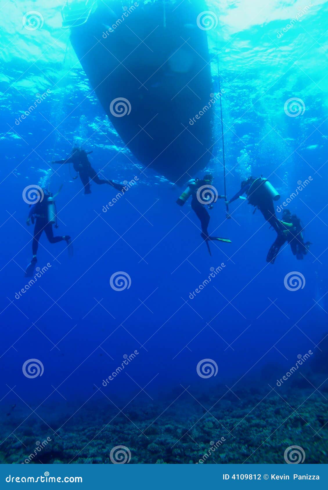 Scuba Divers on a Safety Stop Stock Photo Image of sand, blue 4109812