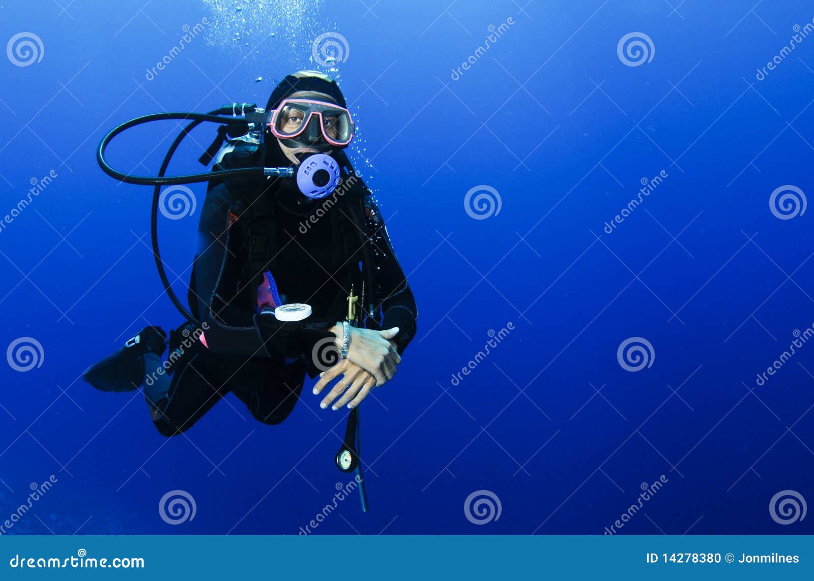 scuba diving in clear blue water