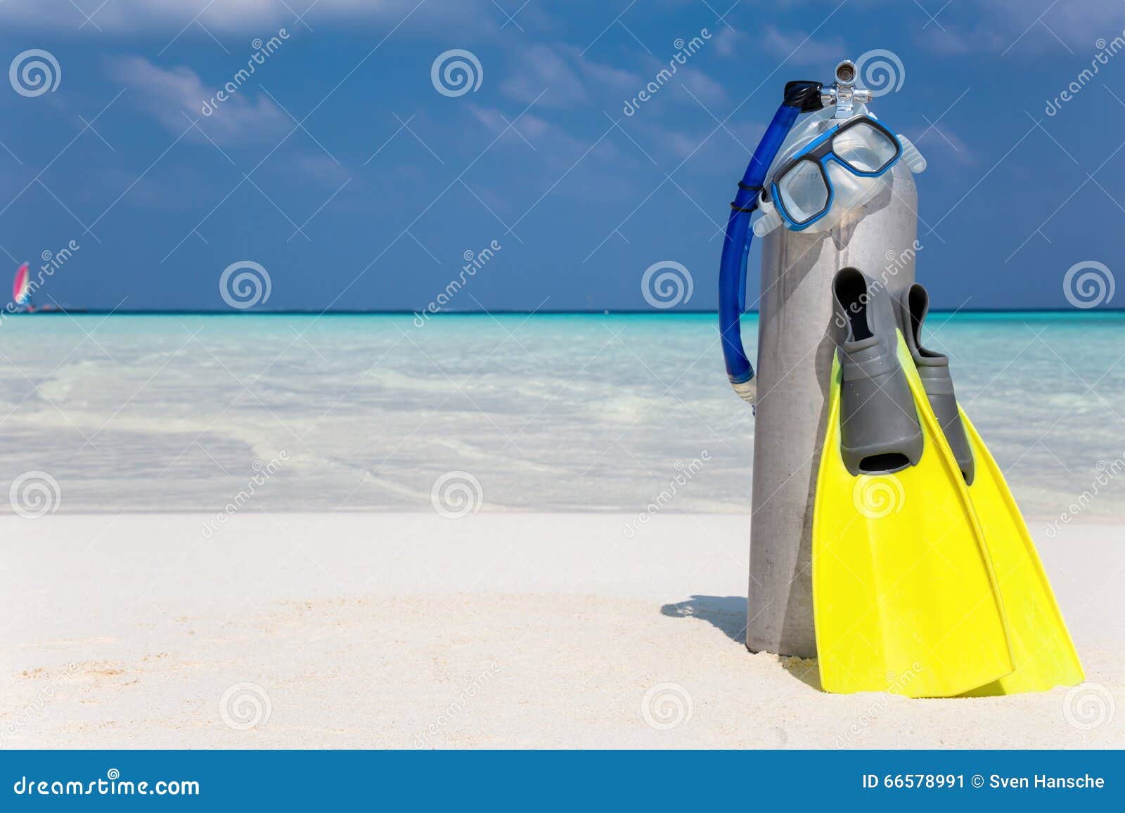 scuba diving gear on beach