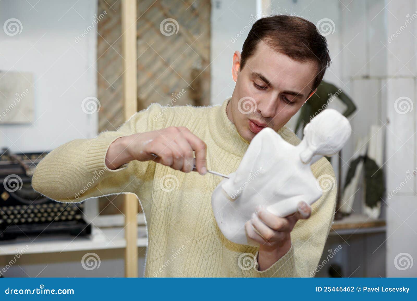 Sculptor Files in Studio Body of Sculpture. Stock Photo Image of