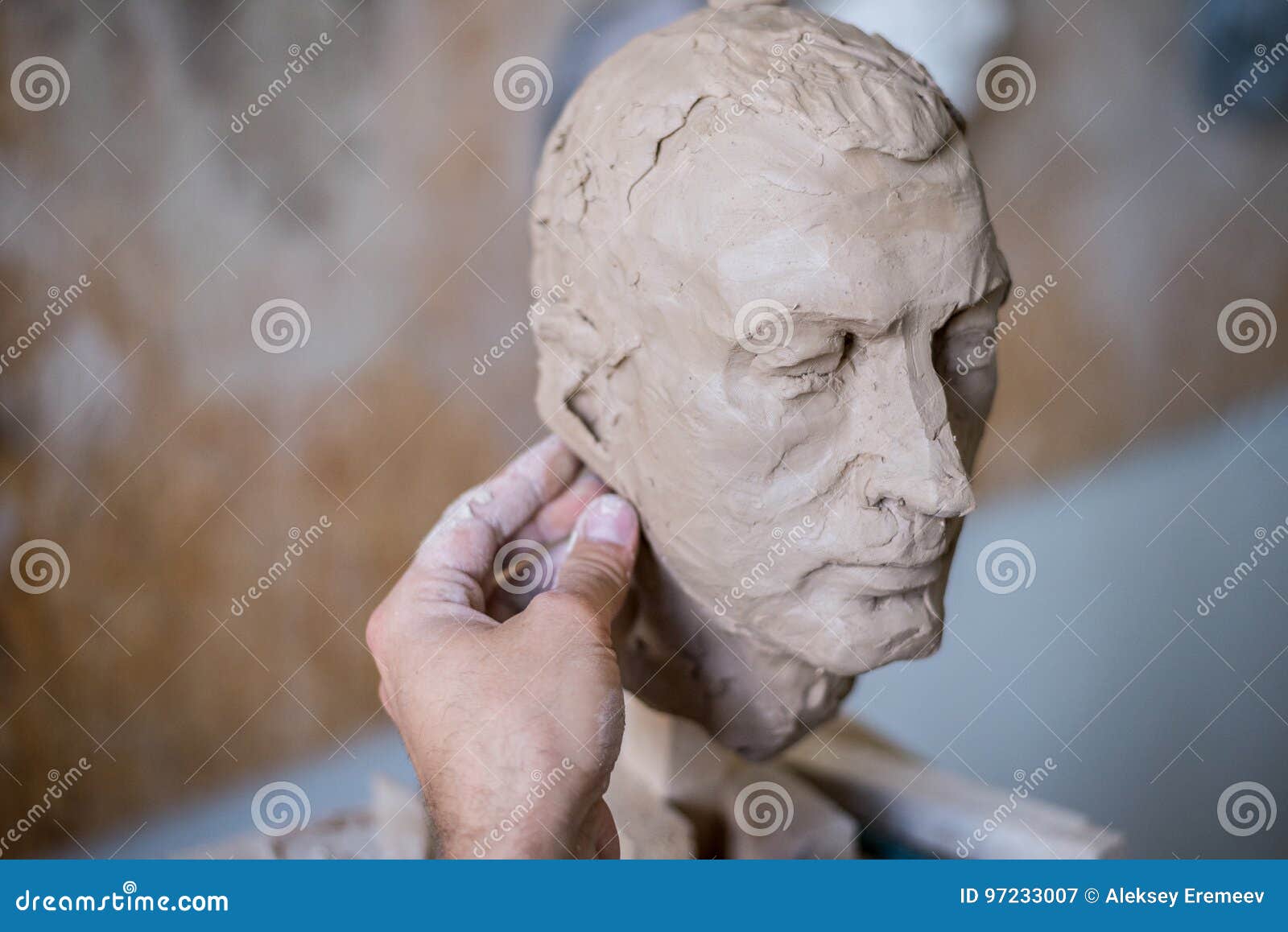 A Sculptor Sculpts a Sculpture of a Person`s Face. Horizontal Frame