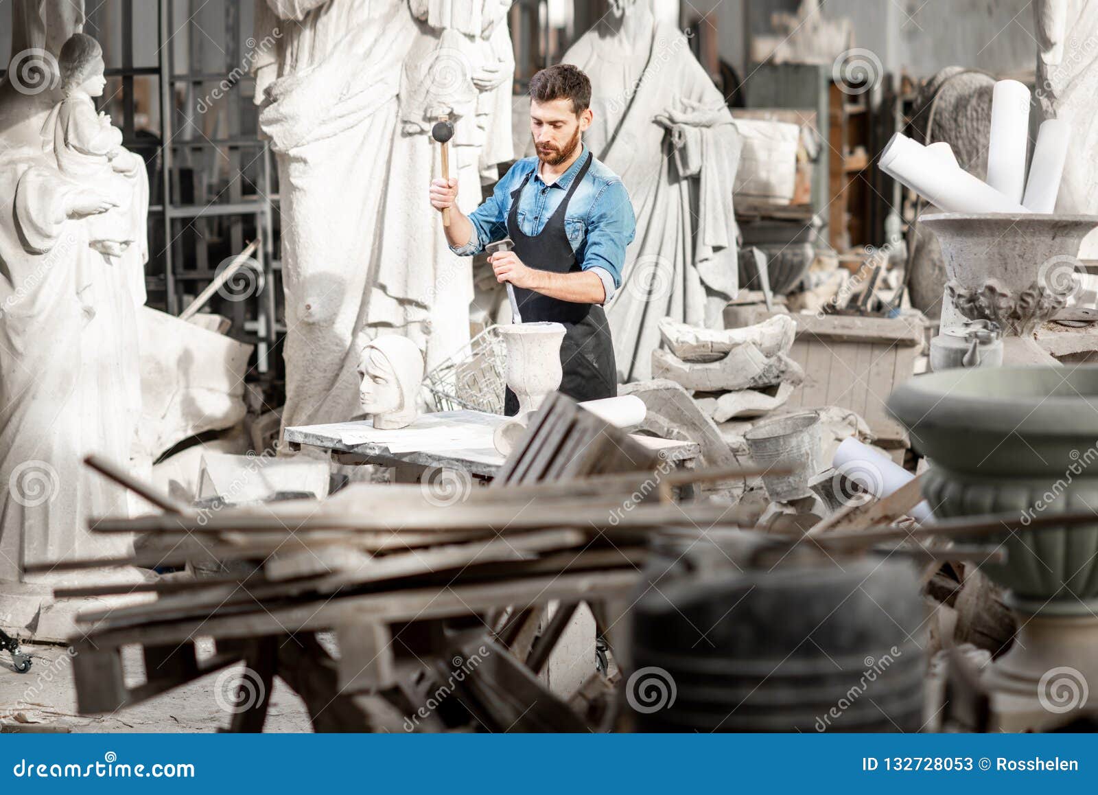 Sculptor Working with Sculptuers in the Studio Stock Image Image of