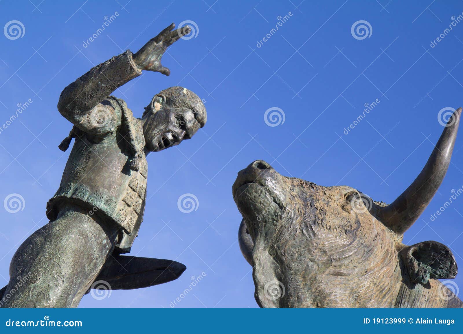 sculpture of a bullfighter in front of his fight b