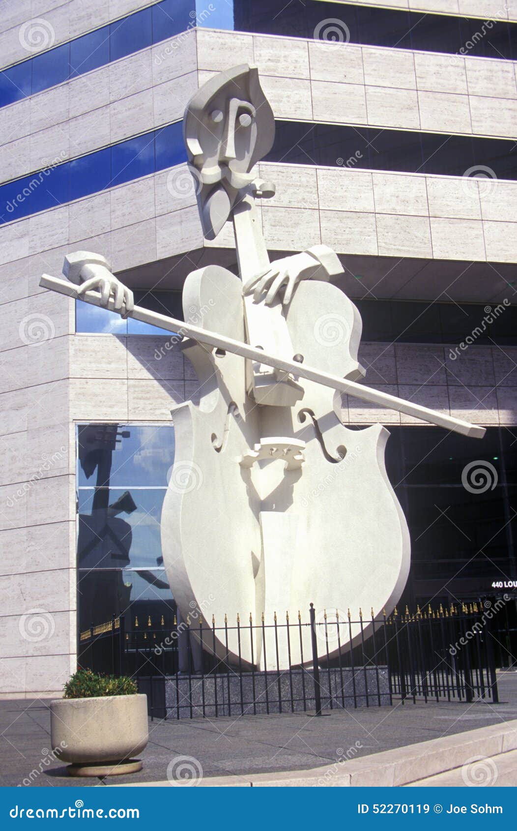 sculpture of cello player in houston tx