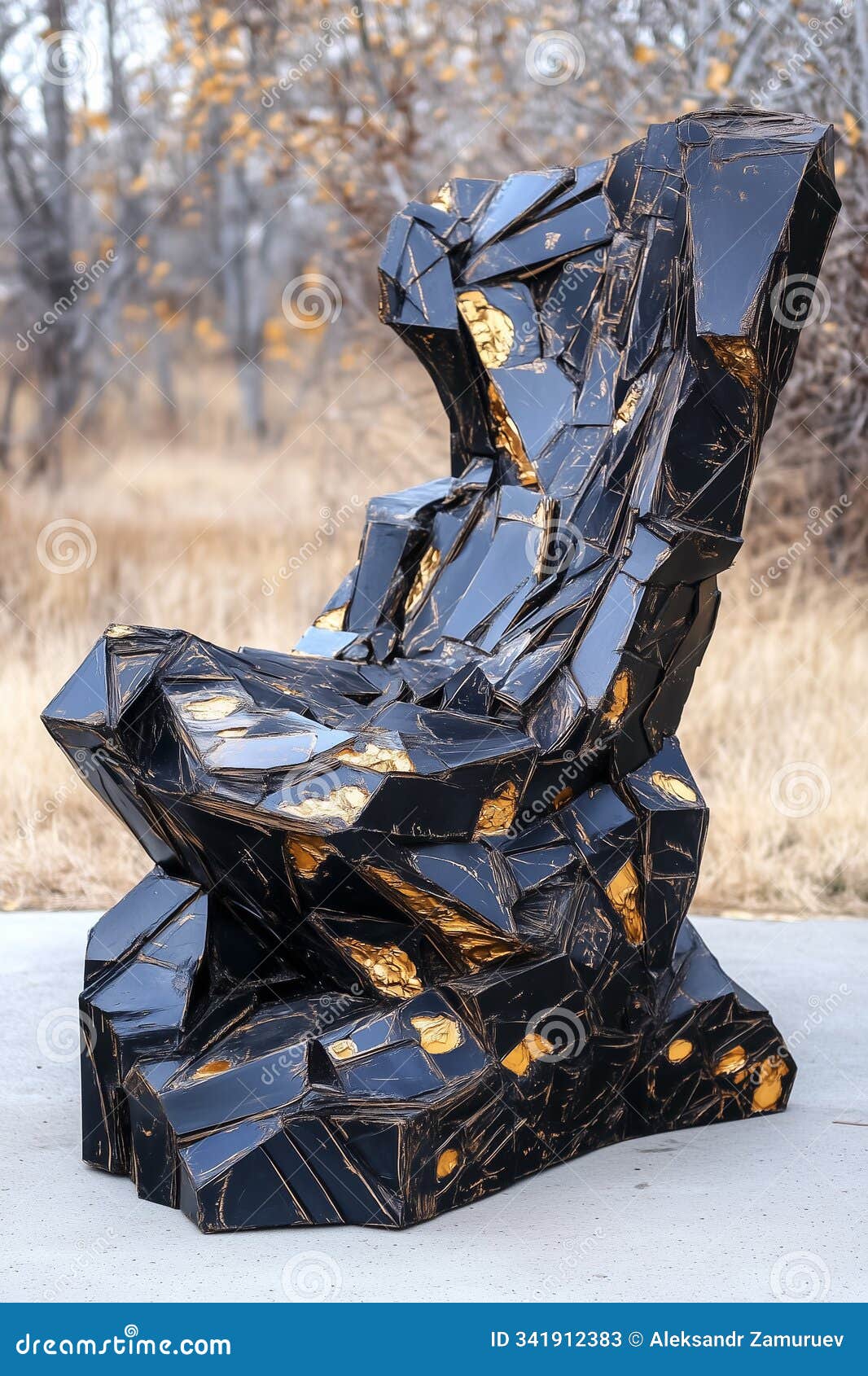 the sculpture features bold black and gold colors, inviting viewers to appreciate its artistic form amidst nature