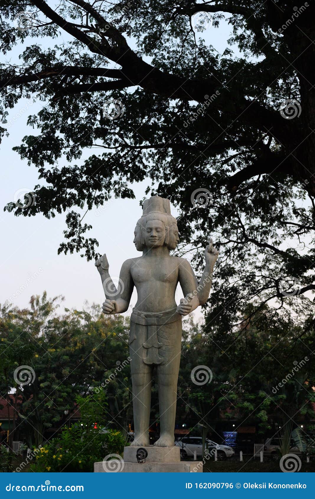 Sculpture of a Four armed Hindu Deity Mythical Creature with Four Sculpture of a Four armed Hindu Deity Mythical Creature with Four
