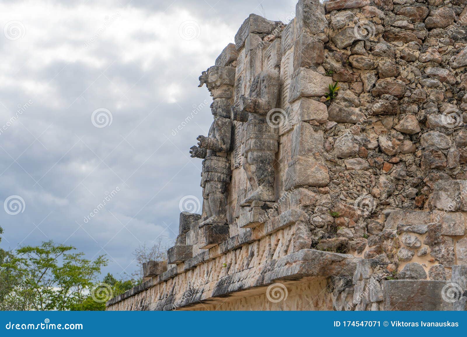 sculpture of the warrior. fragment of palace of the masks codz poop in kabah mayan archaeological site. yucatan.