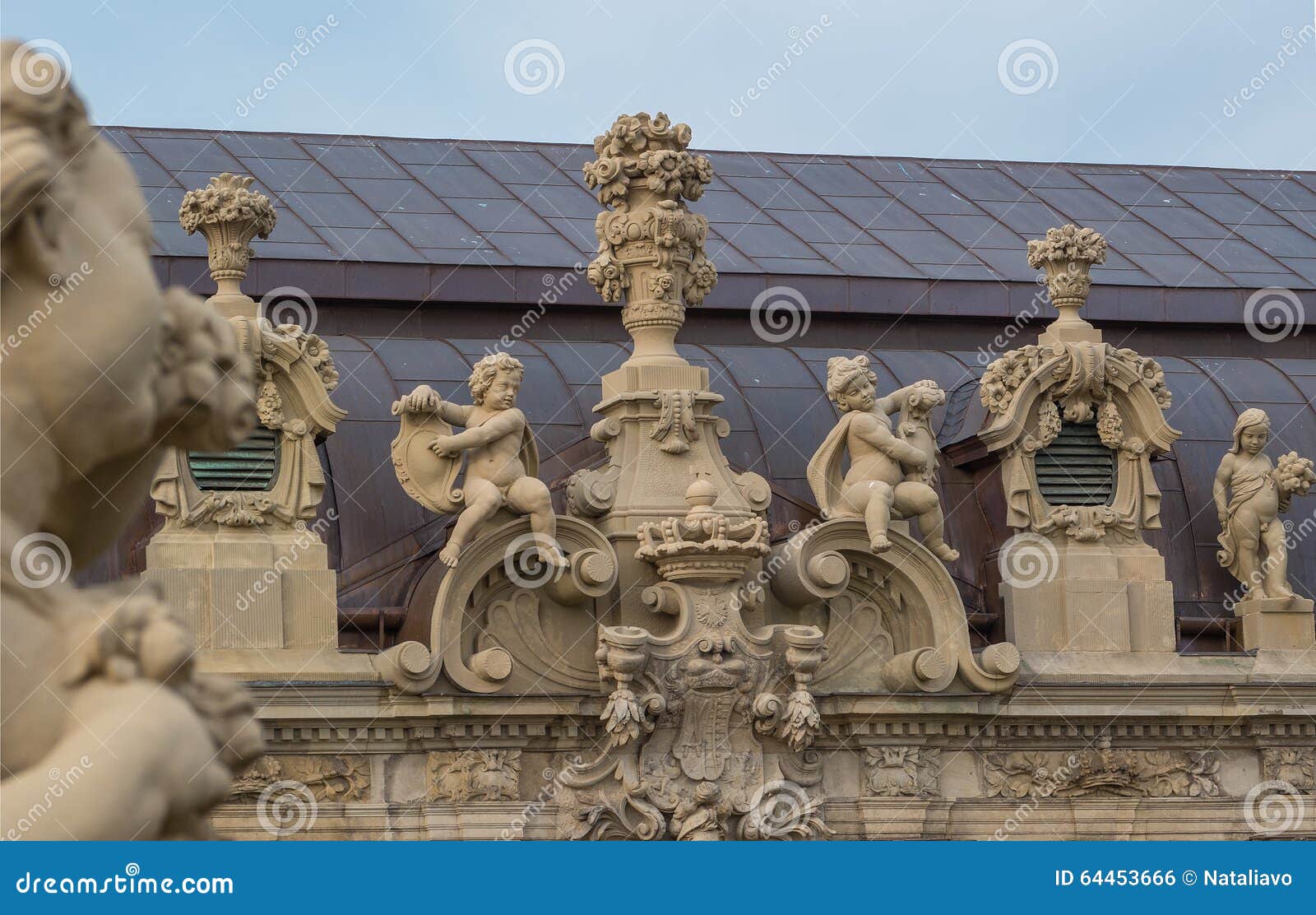 sculptures on the roof of the palace zwinger. dresden, germany