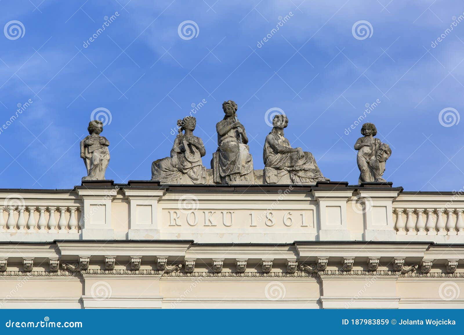 sculptures at the top of the building on the krakowskie przedmiescie street, warsaw, poland