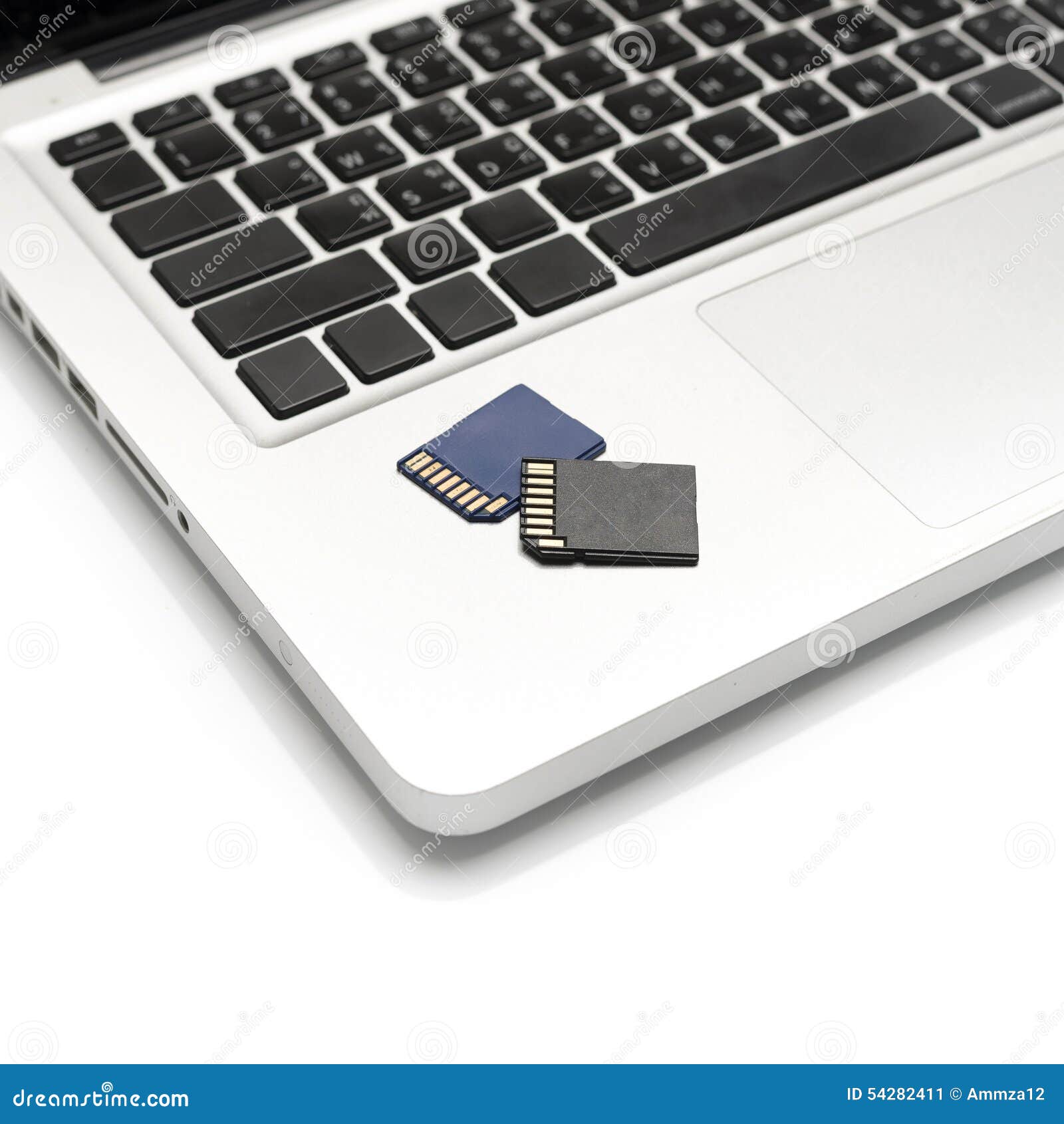 Sd card on laptop stock image. Image of modern, portable 54282411