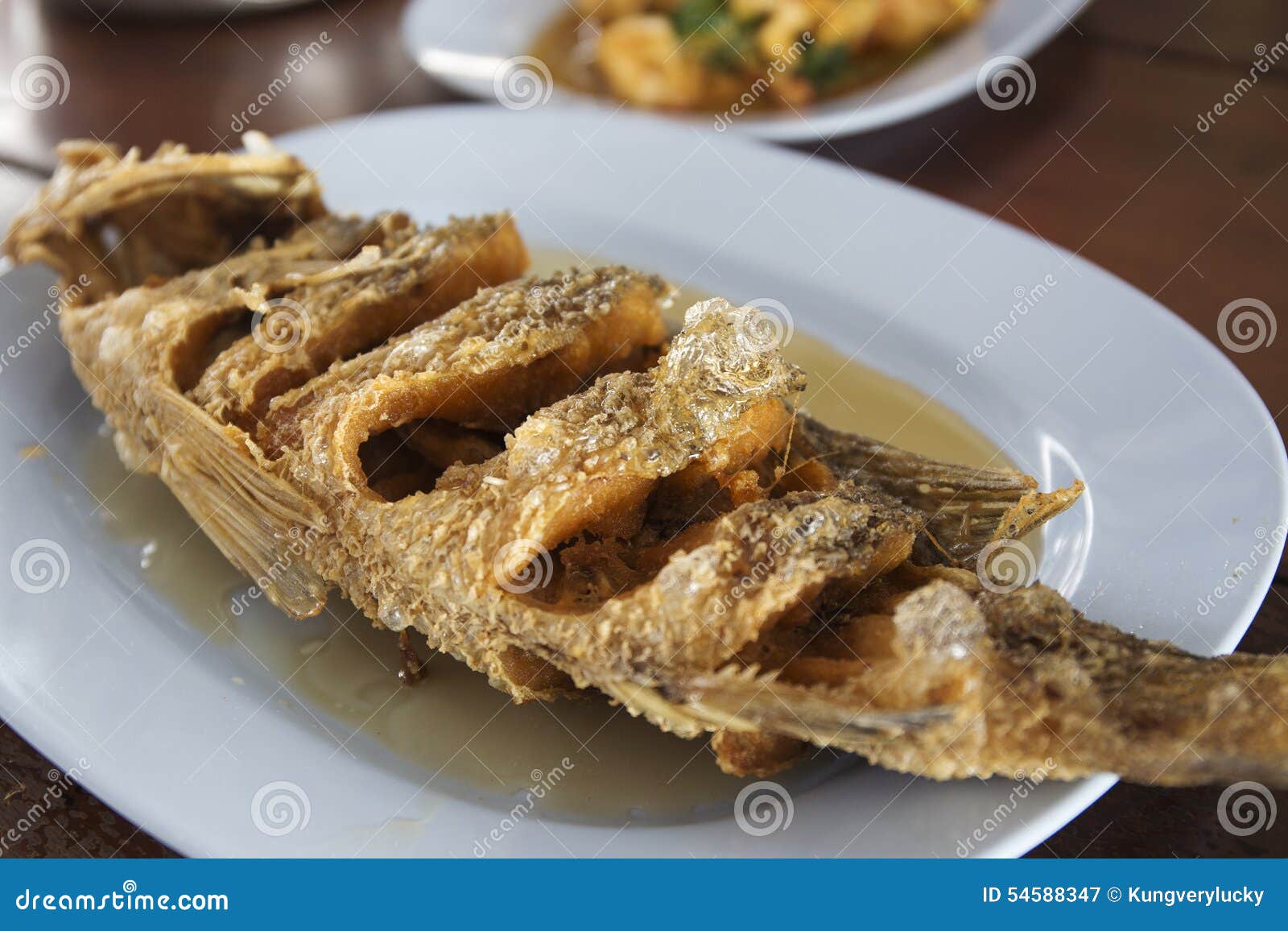 Sea Bass fish deep fried stock image. Image of deep, eating 54588347