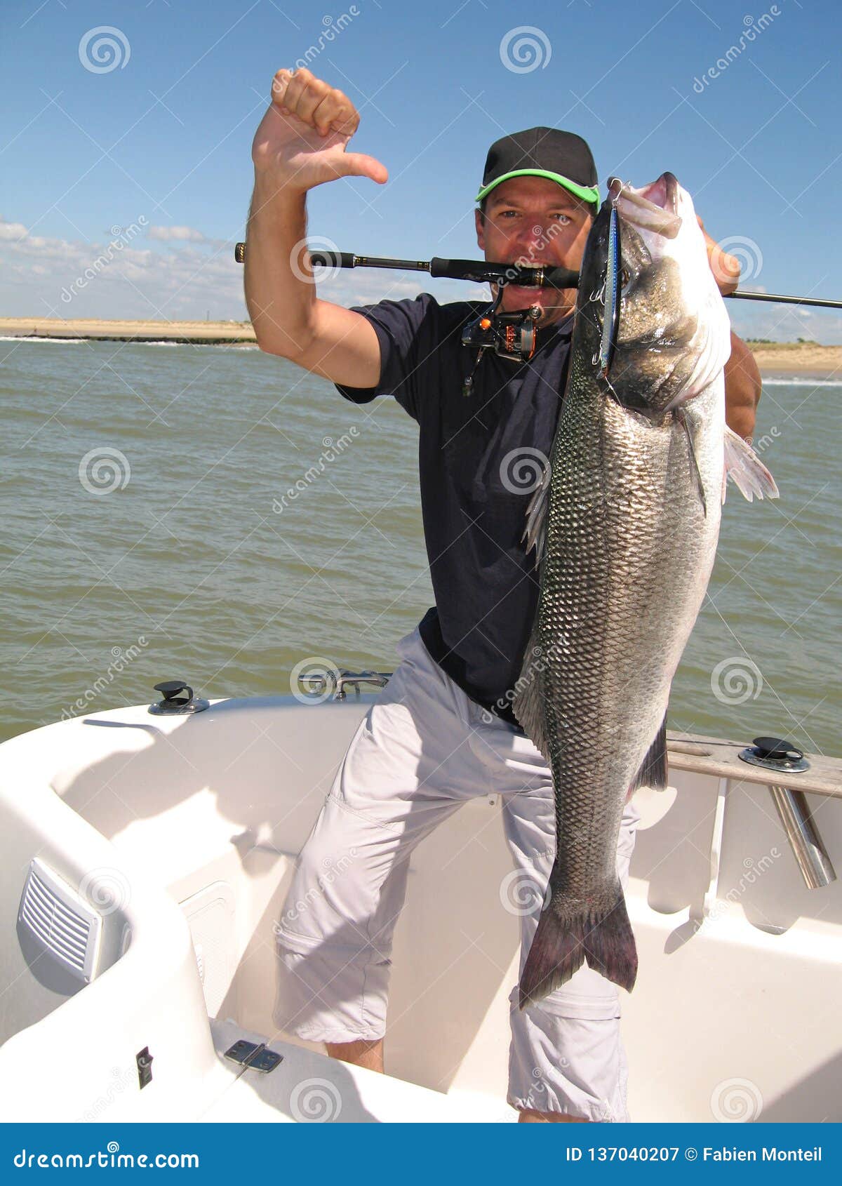 Sea Bass Fishing, Catch of Fish Stock Image - Image of smiling, pole:  137040207