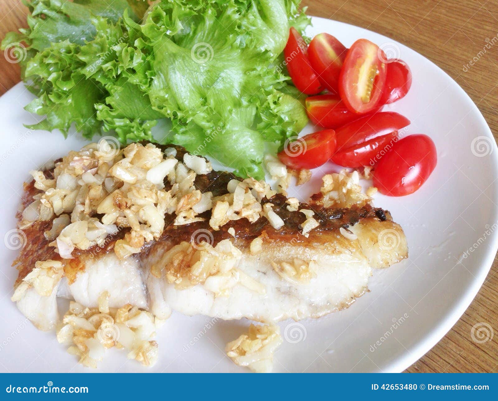 Sea bass steak stock photo. Image of garlic, seabass 42653480